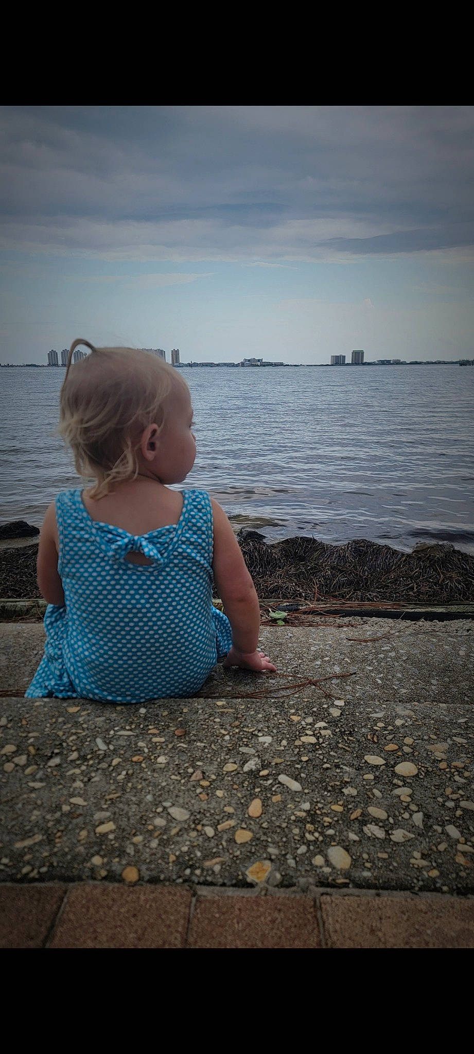 Erynn joined the competition — help win amazing prizes! azure, baby_toddler_clothing, beach, cloud, coast, flash_photography, fun, happy, horizon, lake, leisure, people_in_nature, person, shore, sitting, sky, sunlight, toddler, water, wind_wave