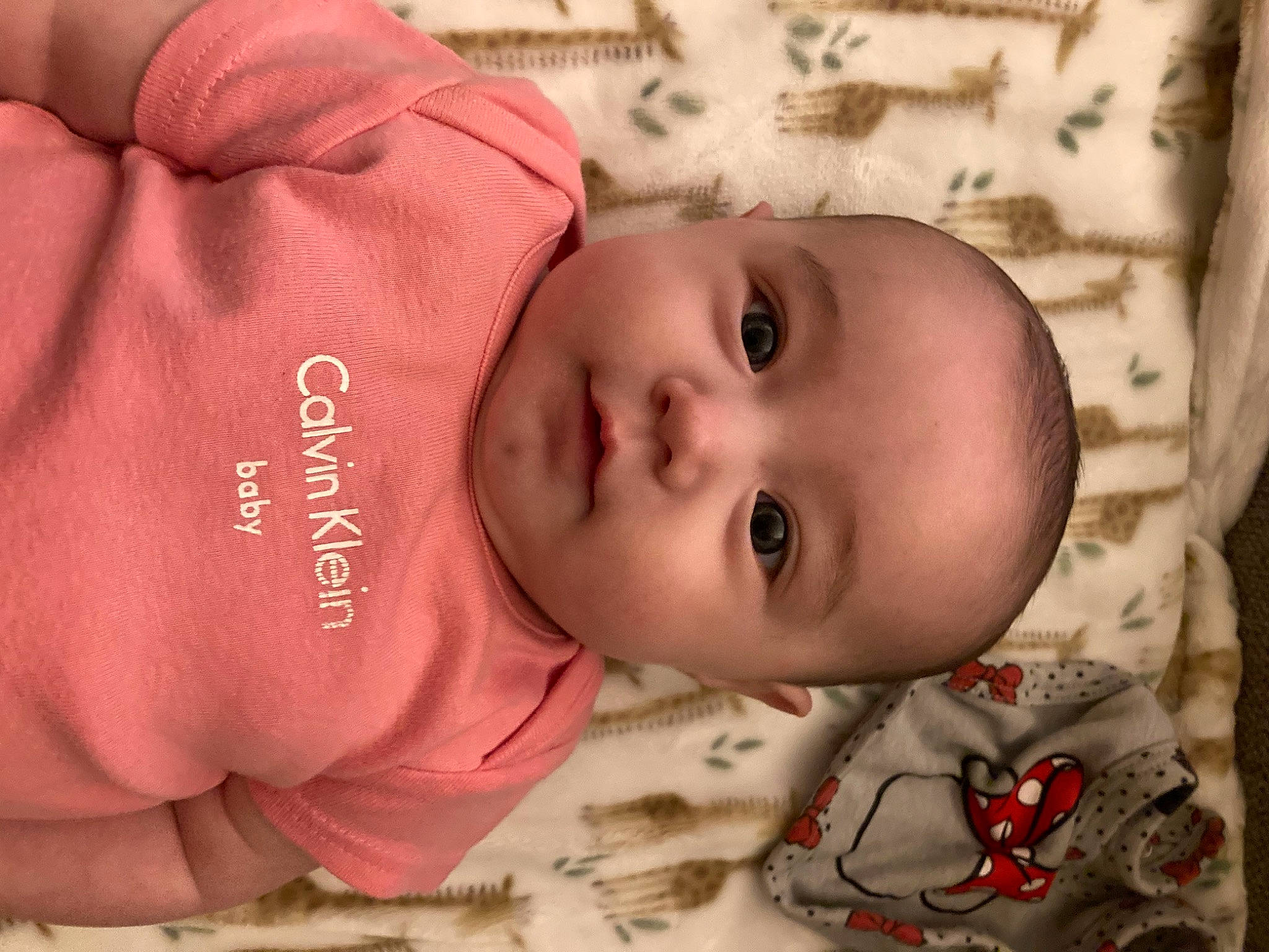 Kahmila is registered to the contest to win money with this photo: baby, baby_toddler_clothing, cheek, chin, comfort, eye, eyebrow, face, facial_expression, head, headgear, human, iris, lip, nose, person, product, skin, sleeve, textile