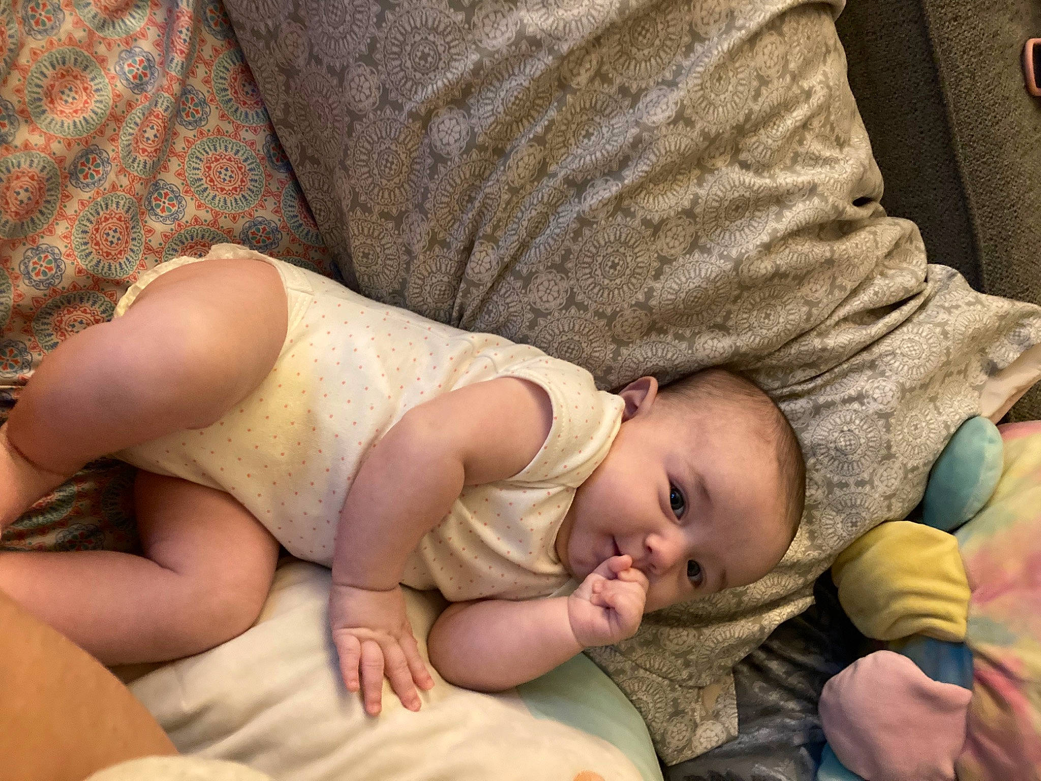 Kahmila is registered to the contest to win money with this photo: abdomen, baby, baby_toddler_clothing, cheek, chest, child, comfort, eye, finger, foot, hand, head, human_leg, leg, person, sitting, skin, thigh, toddler, trunk