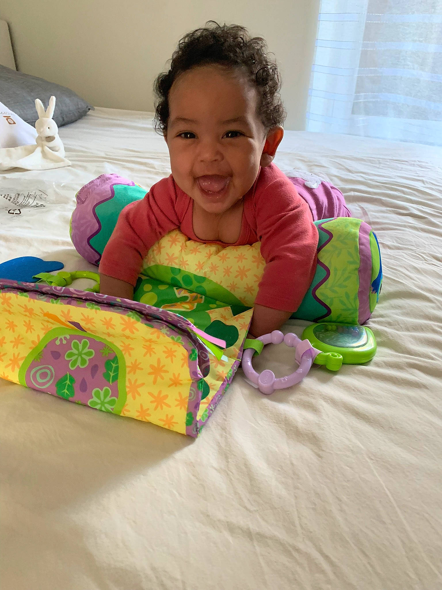 Tayanna participe au concours pour gagner de l'argent avec cette photo : baby, baby_products, baby_toddler_clothing, baby_toys, bedding, child, comfort, flooring, fun, grass, happy, joy, leisure, linens, person, pillow, play, product, sitting, smile