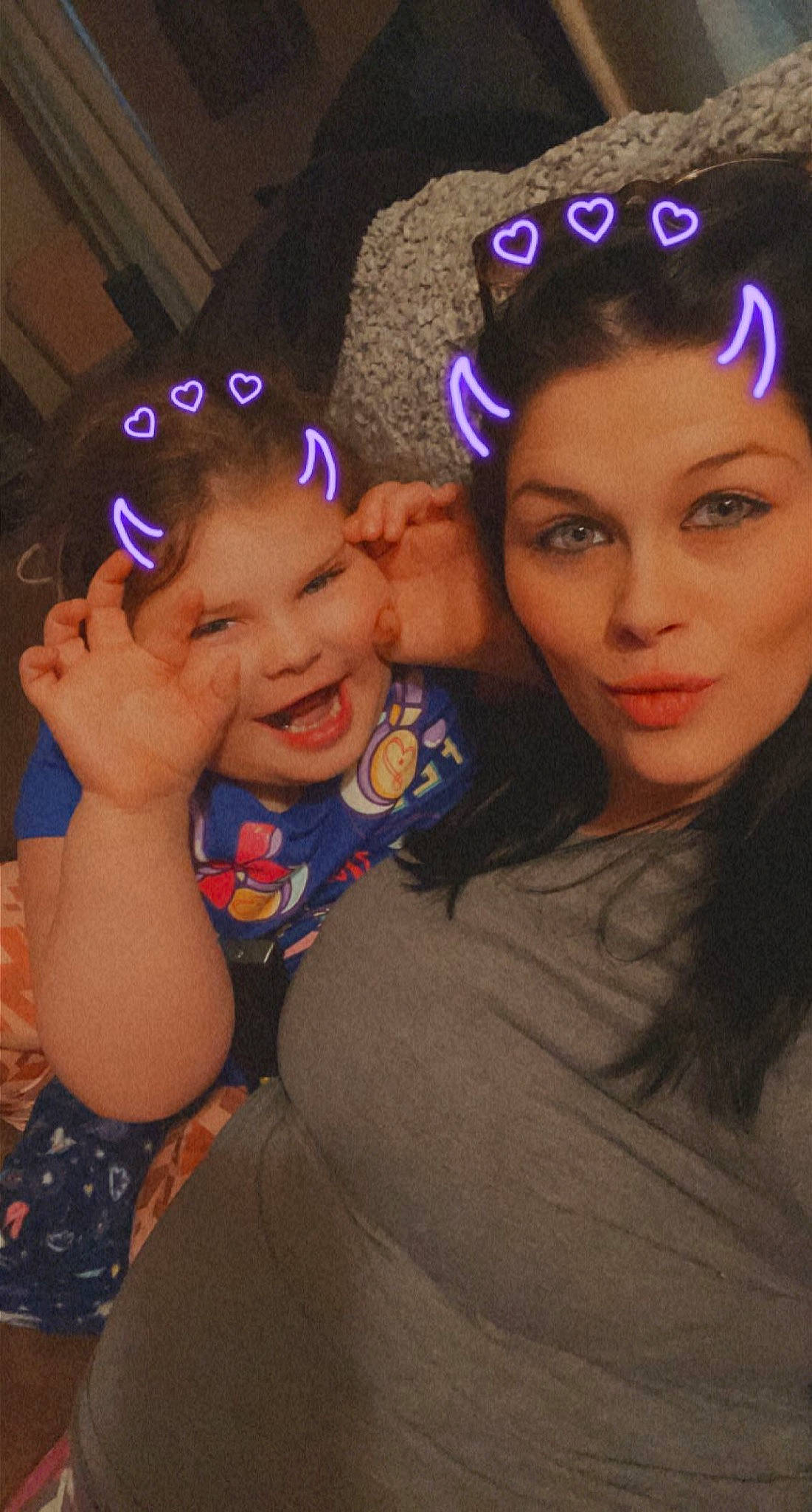 Gracelynn joined the competition — help win amazing prizes! cap, cool, ear, electric_blue, eyebrow, face, flash_photography, fun, gesture, hairstyle, happy, head, headgear, headpiece, interaction, joy, person, pink, purple, smile