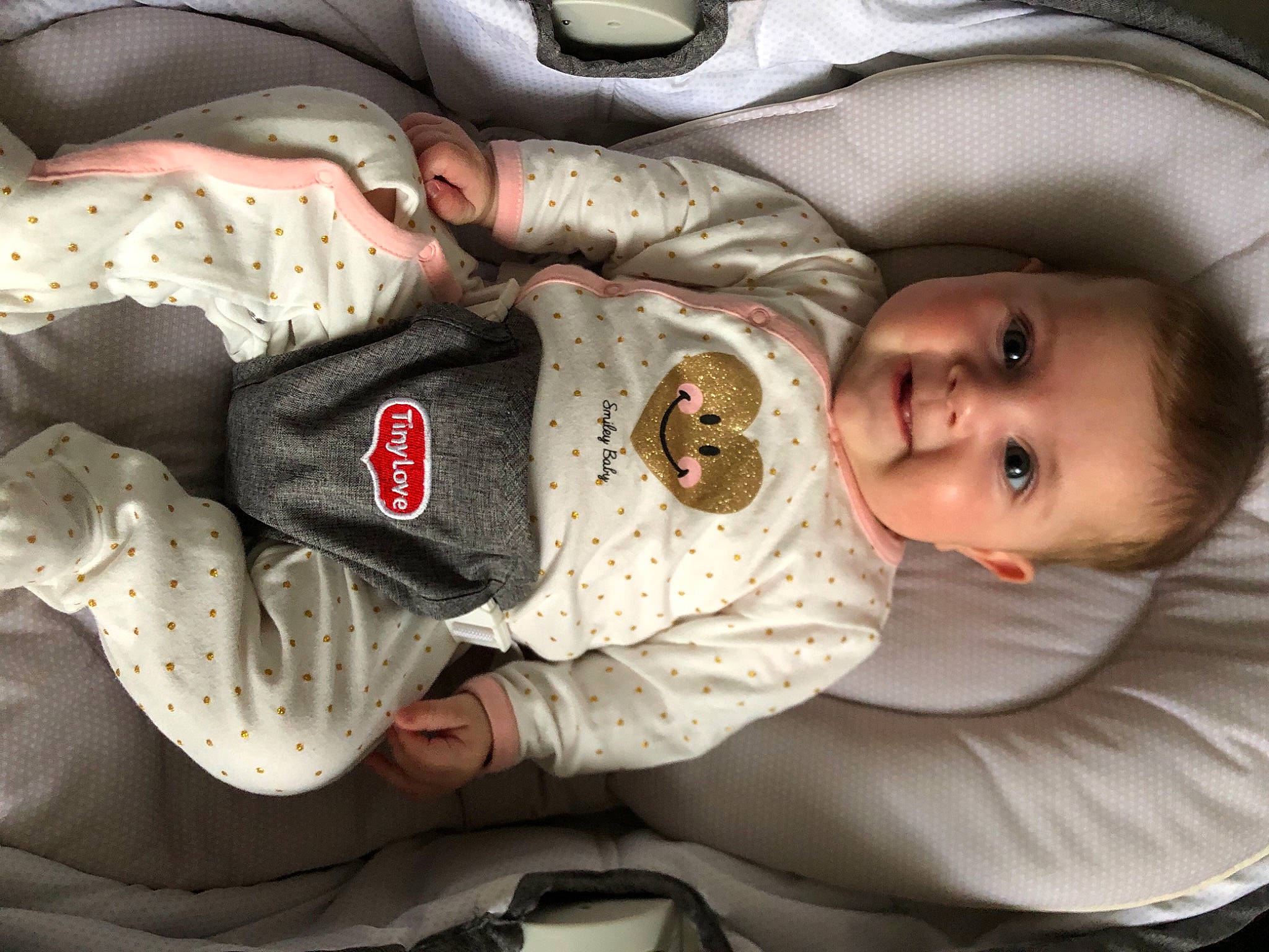 Mya Rose participe au concours pour gagner de l'argent avec cette photo : arm, baby, baby_carriage, baby_products, baby_toddler_clothing, cheek, comfort, elbow, face, facial_expression, gesture, head, headgear, human_body, joy, mouth, nose, person, skin, sleeve