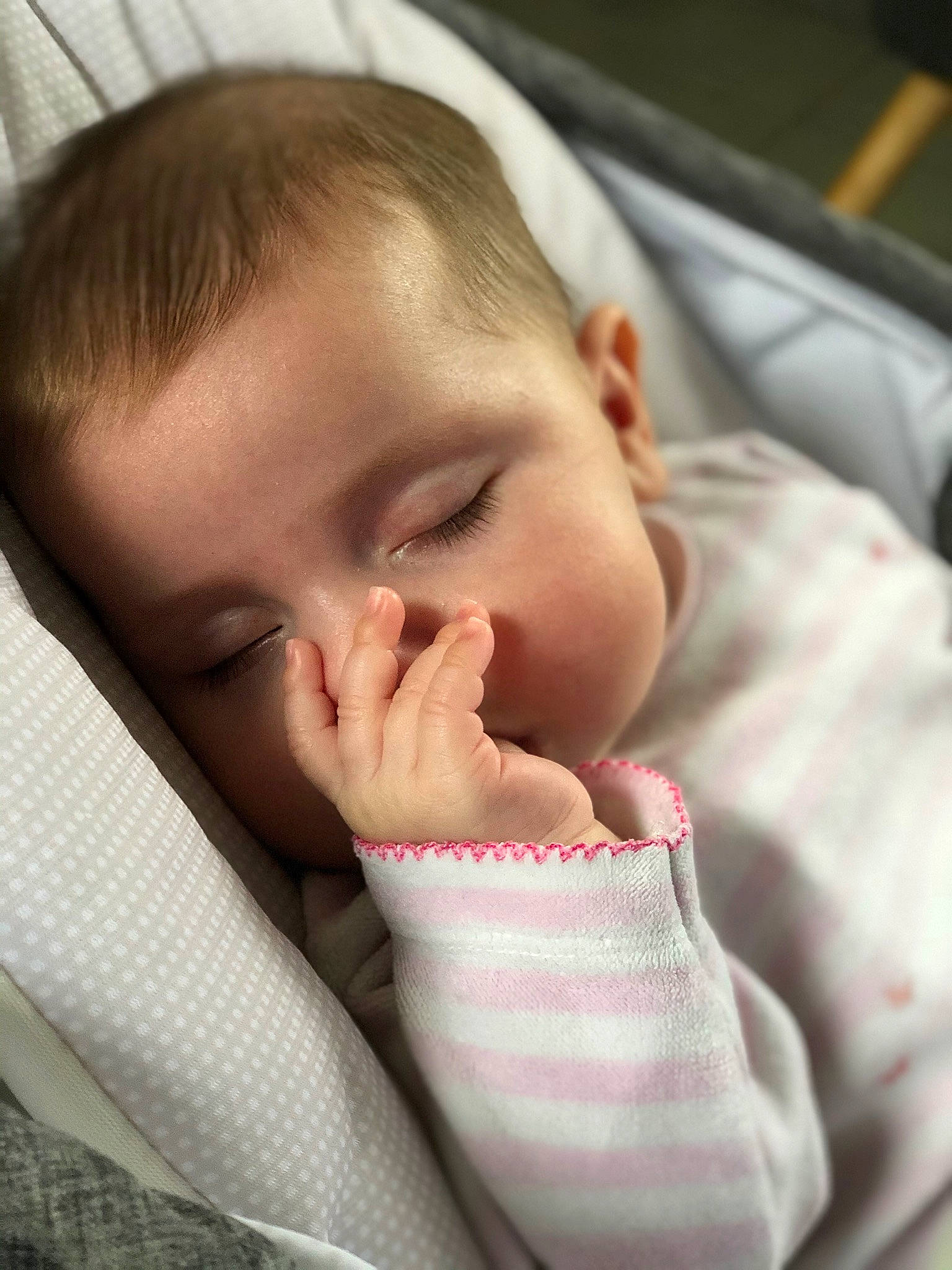 Mya Rose participe au concours pour gagner de l'argent avec cette photo : baby, baby_toddler_clothing, cheek, child, close_up, comfort, ear, eyebrow, eyelash, facial_expression, gesture, happy, linens, lip, mouth, nail, nose, person, smile, thumb