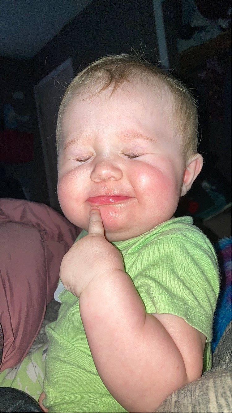 Heidi is registered to the contest to win money with this photo: baby_toddler_clothing, cheek, ear, eye, eyebrow, eyelash, finger, forehead, gesture, happy, iris, jaw, lip, mammal, mouth, neck, nose, person, skin, smile