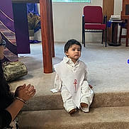 Napoleon joined the competition — help win amazing prizes! adult, carpet, ceremony, chair, child, church_interior, curious_expression, floor, hand_gesture, indoor, person, religious, sitting, small_child, steps, trees, white_clothing, window, wooden_furniture, young