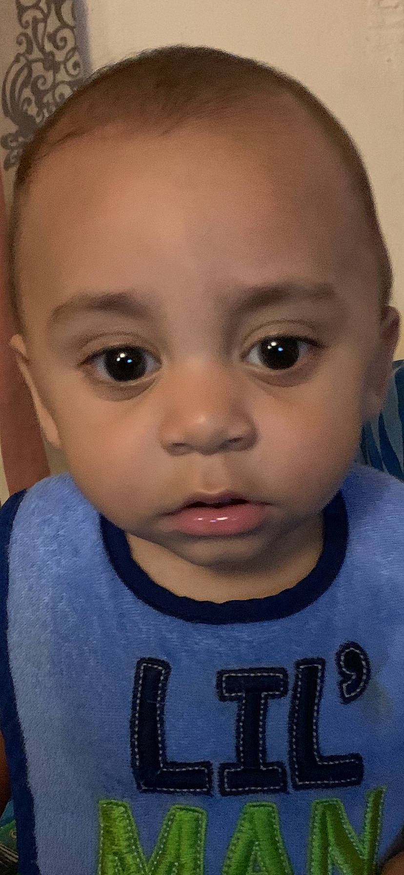 James is registered to the contest to win money with this photo: baby_toddler_clothing, cheek, chin, ear, eye, eyebrow, eyelash, flash_photography, forehead, human, iris, jaw, lip, mouth, neck, nose, person, skin, sleeve, t_shirt