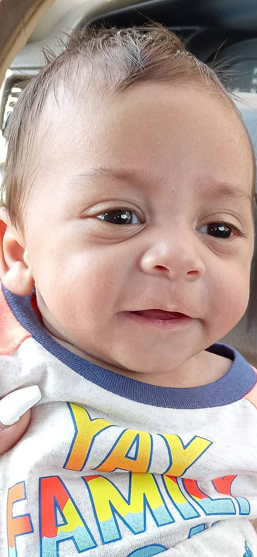 James is registered to the contest to win money with this photo: baby, baby_toddler_clothing, cheek, chin, ear, eye, eyebrow, eyelash, facial_expression, happy, iris, lip, mouth, neck, nose, organ, person, photograph, skin, toddler