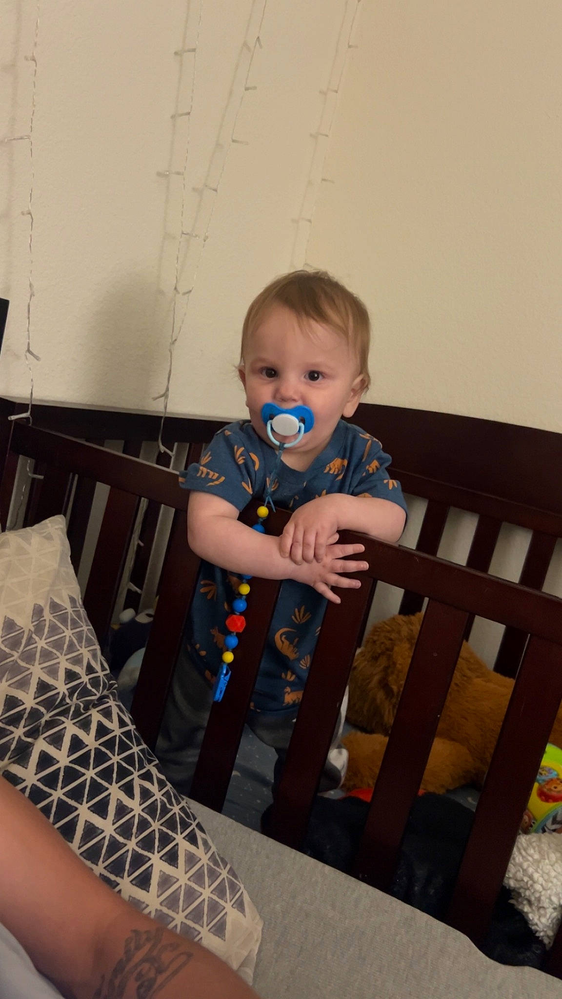 Jackson is registered to the contest to win money with this photo: baby, baby_products, baby_safety, baby_toddler_clothing, chair, child, comfort, flooring, fun, hardwood, human_leg, pattern, person, play, room, sitting, sleeve, sock, t_shirt, toddler