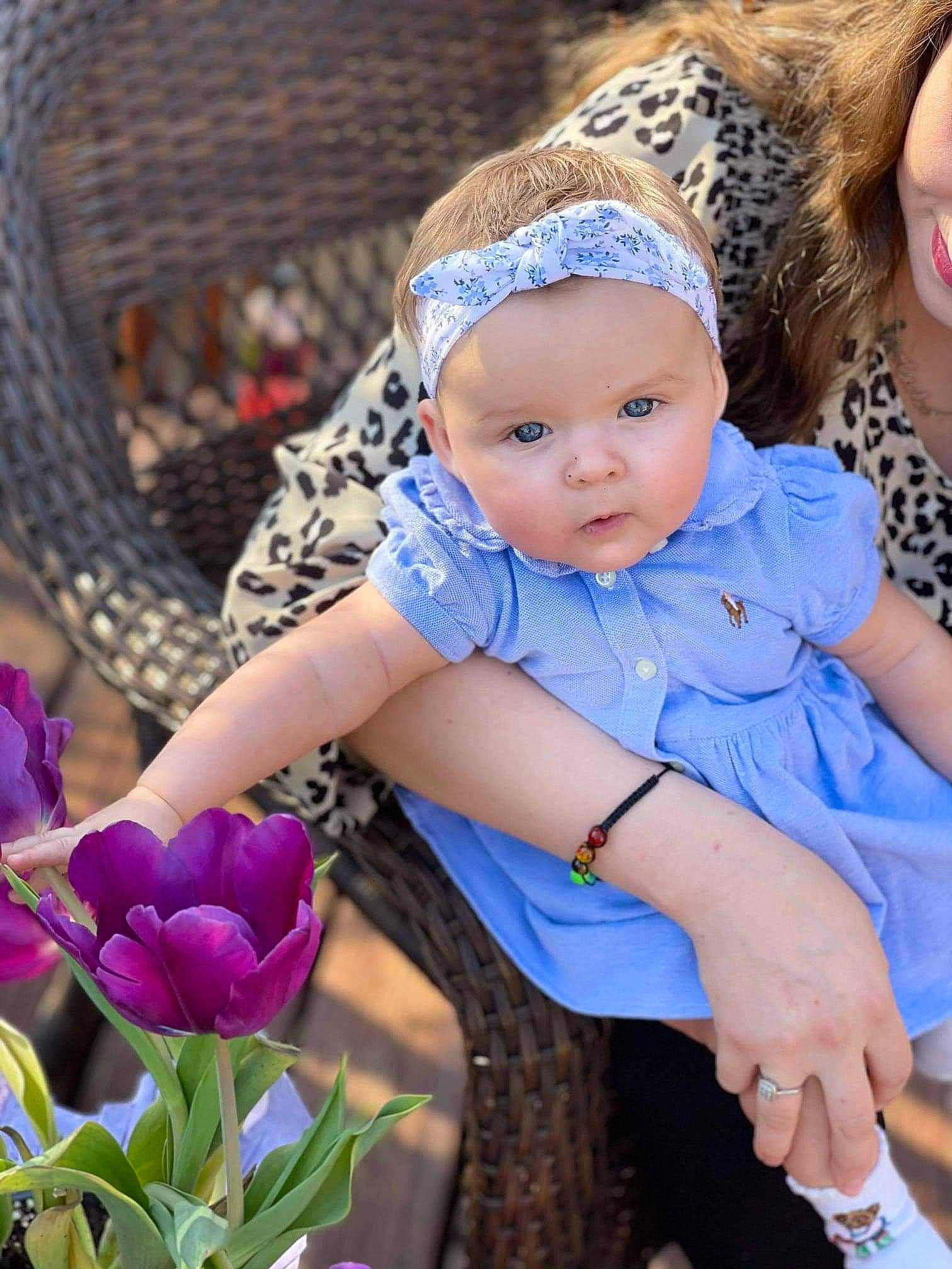 October joined the competition — help win amazing prizes! baby, baby_toddler_clothing, blue, dress, eye, face, flower, fun, grass, happy, hat, headwear, iris, people_in_nature, person, petal, photograph, plant, purple, skin