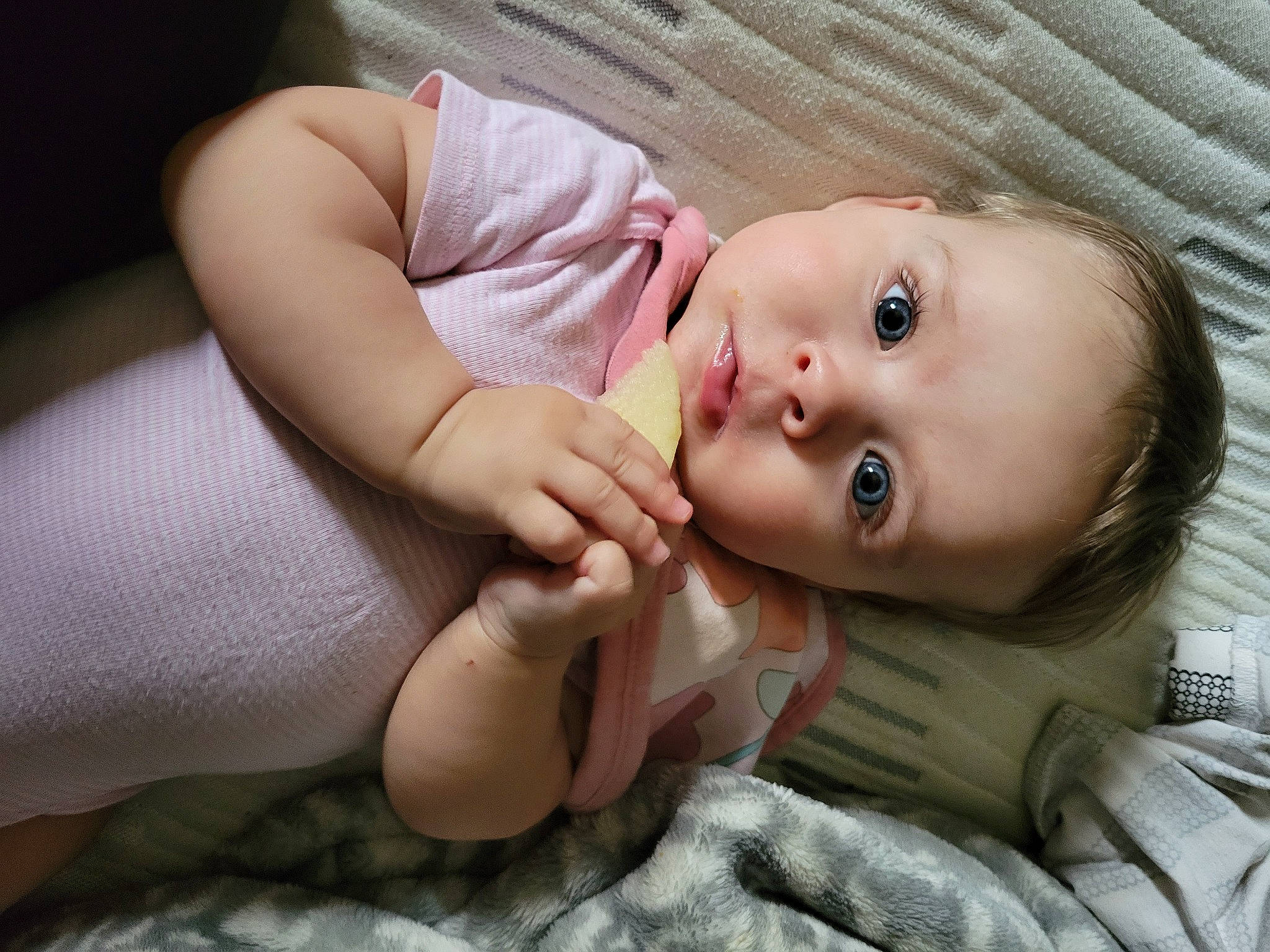 October is registered to the contest to win money with this photo: baby, baby_toddler_clothing, cheek, comfort, ear, eyebrow, eyelash, finger, gesture, happy, human_body, iris, lip, mouth, nail, neck, nose, person, skin, thumb