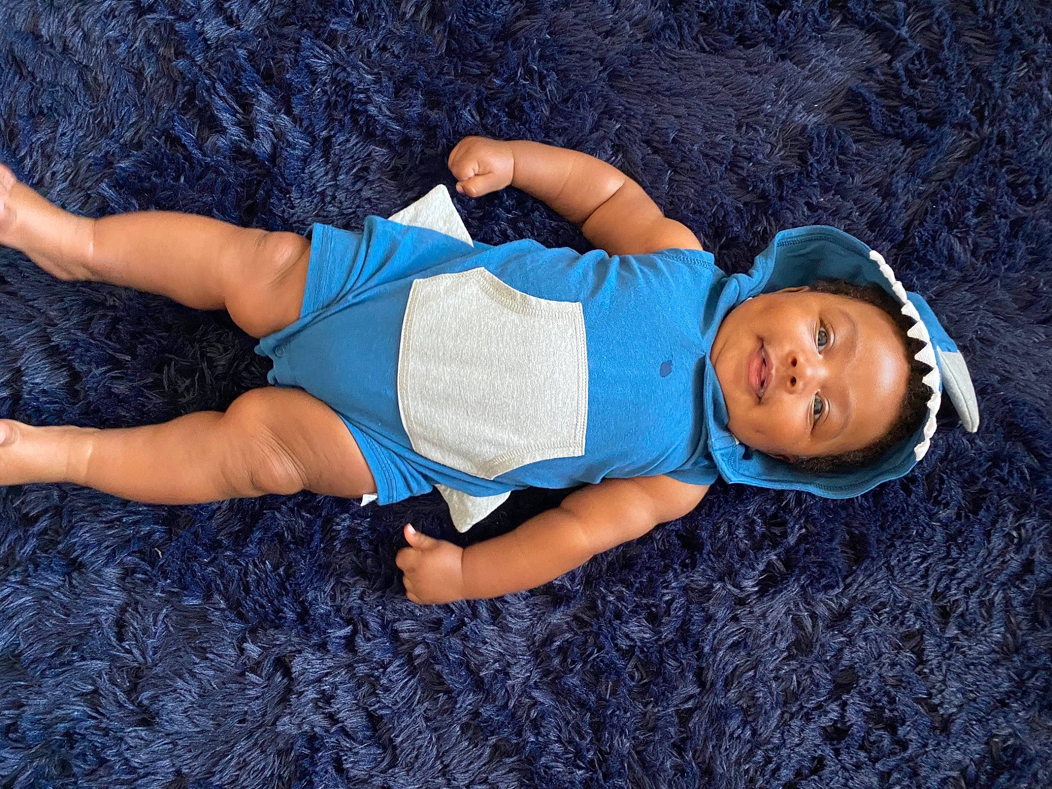 Brandon joined the competition — help win amazing prizes! arm, baby, blue, child, fun, grass, jeans, leg, muscle, person, photography, sleep, toddler, tree, vacation