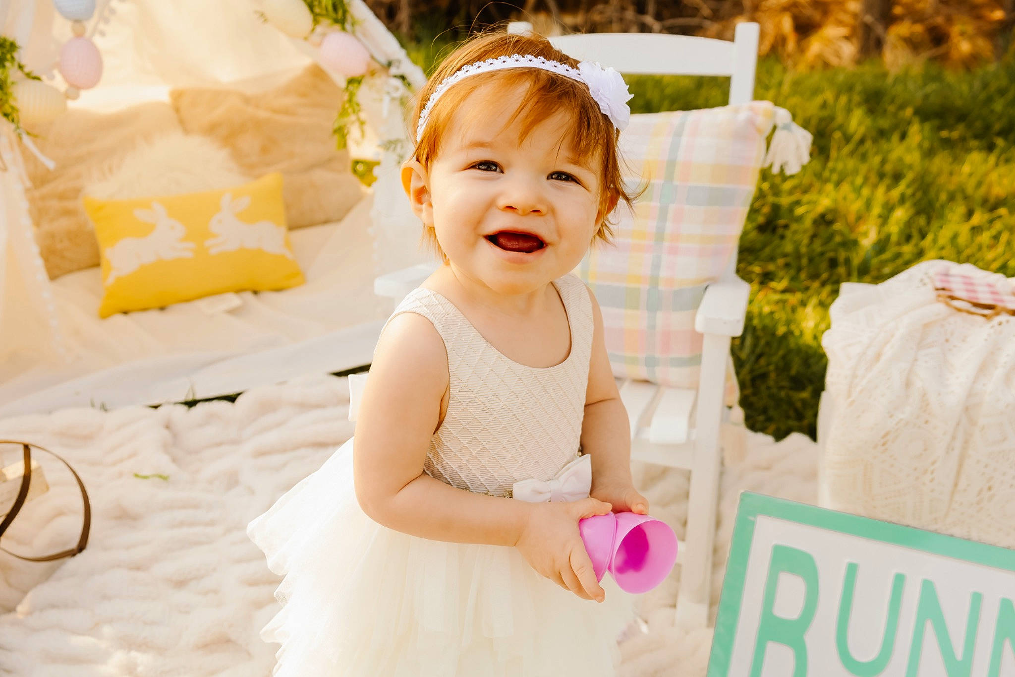 Kinsley is registered to the contest to win money with this photo: baby, baby_toddler_clothing, child, dress, event, face, flash_photography, fun, grass, happy, joy, peach, people, people_in_nature, person, photograph, pink, skin, sleeve, smile