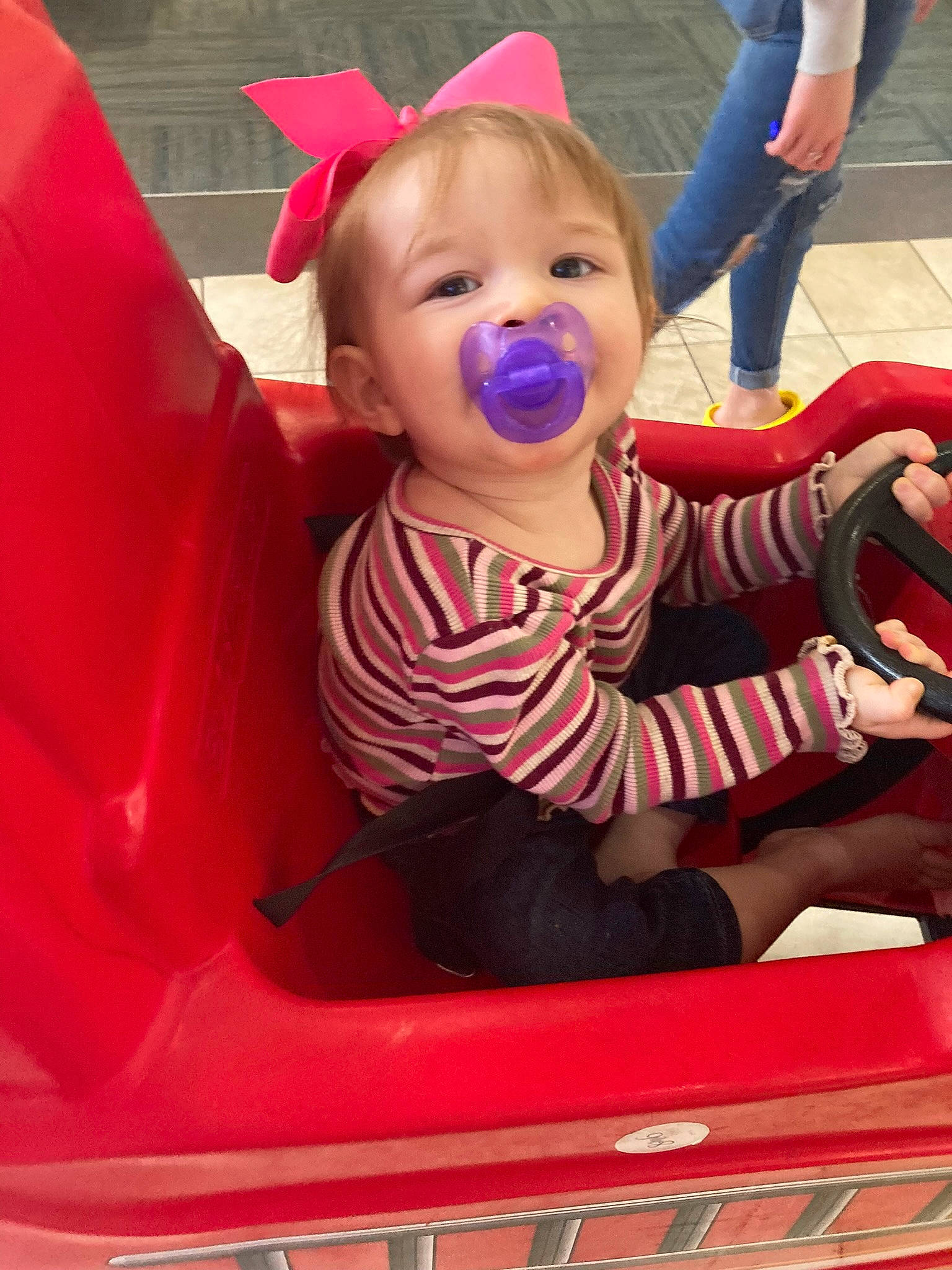 Kinsley joined the competition — help win amazing prizes! automotive_exterior, baby, baby_toddler_clothing, bumper, child, fun, happy, leisure, magenta, motor_vehicle, person, pink, play, product, recreation, red, riding_toy, sitting, snapshot, toddler