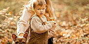 Arsène a rejoint le concours — aidez-le/la à gagner de superbes lots ! toddler, child, dog, french_bulldog, forest, autumn, leaf, overalls, sweater, shoes, adult, nature, outdoor, sunlight, trees, blurred_background, pet, walking, crouching, fall