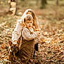 toddler, child, dog, french_bulldog, forest, autumn, leaf, overalls, sweater, shoes, adult, nature, outdoor, sunlight, trees, blurred_background, pet, walking, crouching, fall
