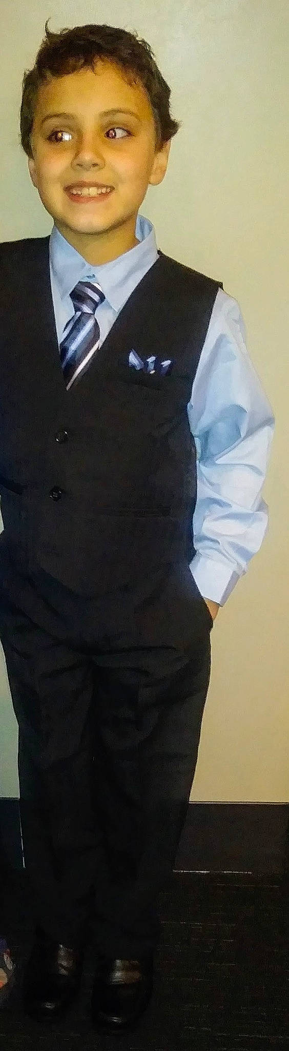 Caleb is registered to the contest to win money with this photo: blazer, button, chest, collar, denim, dress_shirt, electric_blue, fashion_accessory, fashion_design, formal_wear, human_body, human_leg, joy, person, pocket, sleeve, sportswear, t_shirt, thigh, trunk