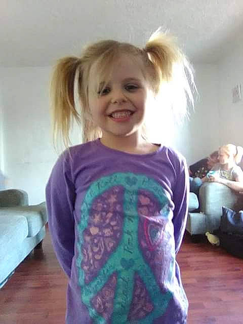 Brookelynn is registered to the contest to win money with this photo: arm, blond, brown_hair, child, clothing, cool, hair, hair_coloring, hairstyle, head, joint, joy, long_hair, neck, outerwear, person, shoulder, sleeve, smile, t_shirt