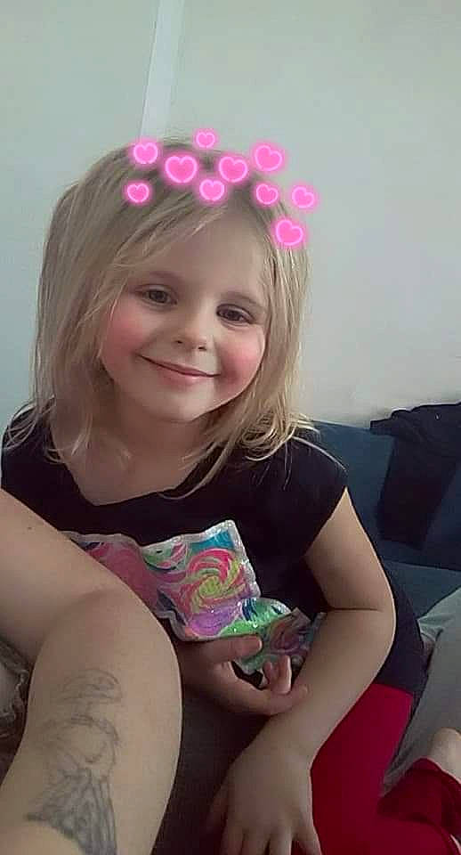 Brookelynn is registered to the contest to win money with this photo: child, ear, fashion_accessory, finger, hair, hair_accessory, hair_coloring, joy, person, pink, play, smile, toddler