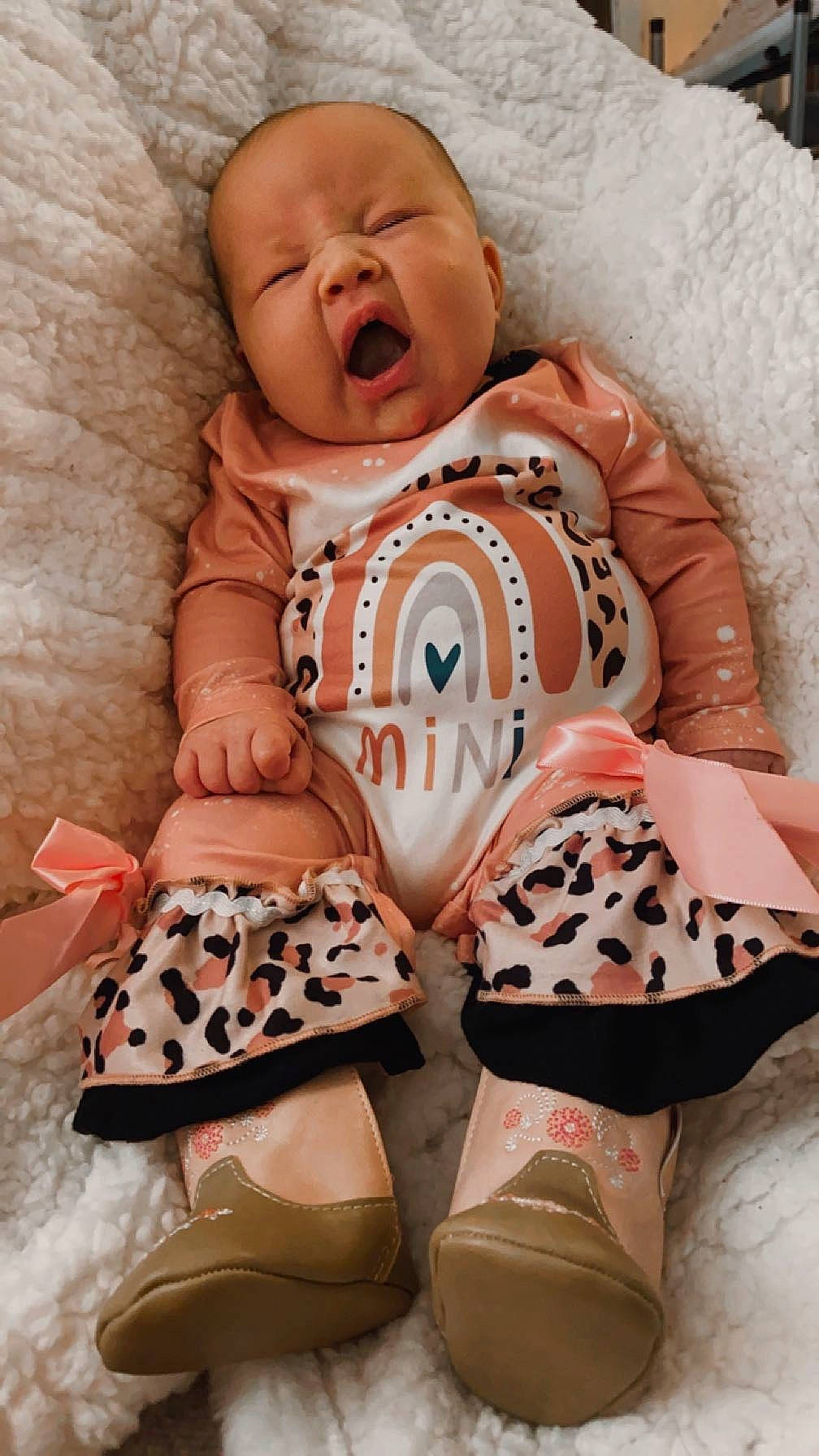 Honey is registered to the contest to win money with this photo: baby, baby_products, baby_sleeping, baby_toddler_clothing, beauty, cheek, child, comfort, design, happy, human_leg, linens, orange, pattern, peach, person, pink, skin, textile, toddler