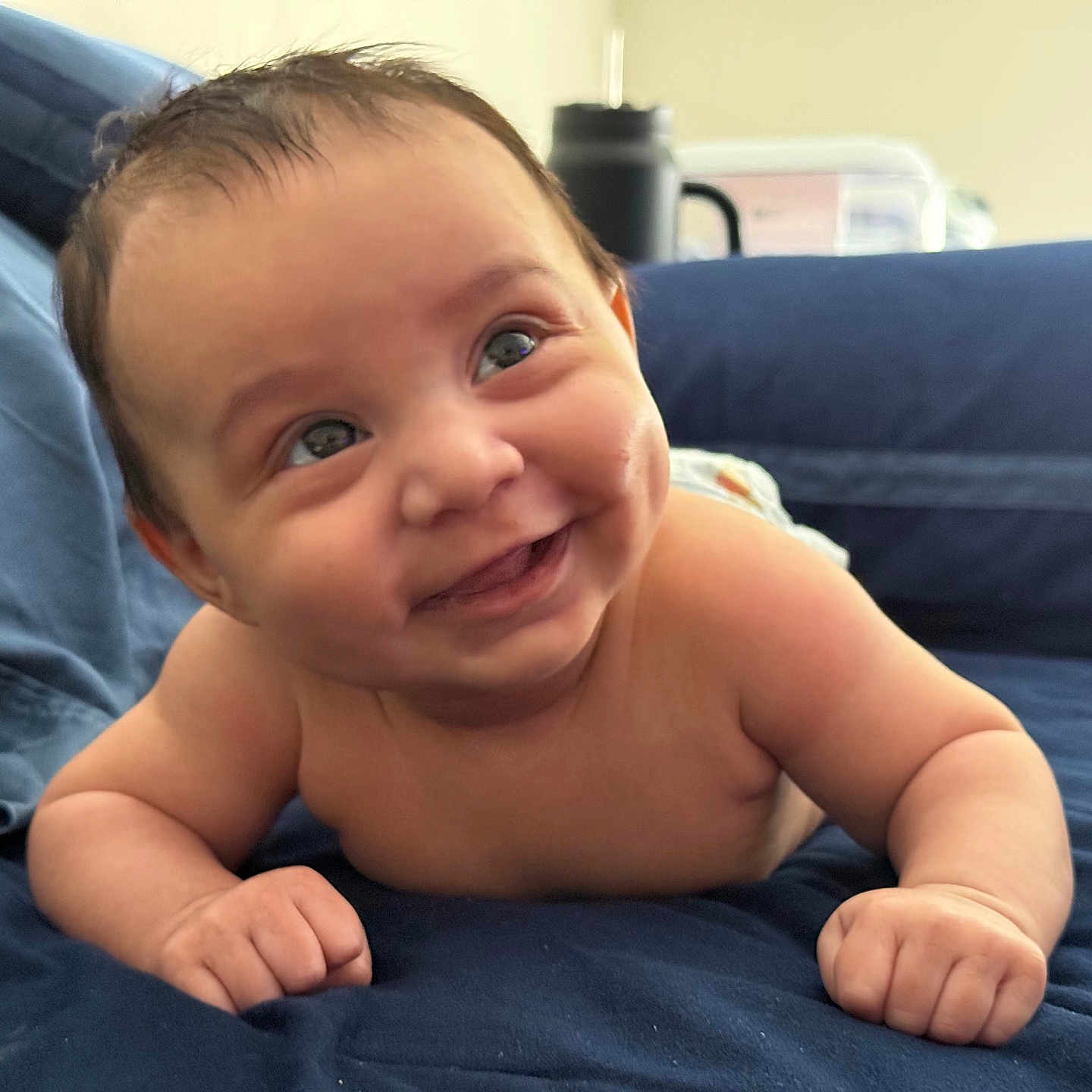 Malakai joined the competition — help win amazing prizes! architecture, baby, babylaughing, bed, bedroom, building, cushion, face, furniture, happy, head, homedecor, indoors, laughing, newborn, person, photography, portrait, room, smile