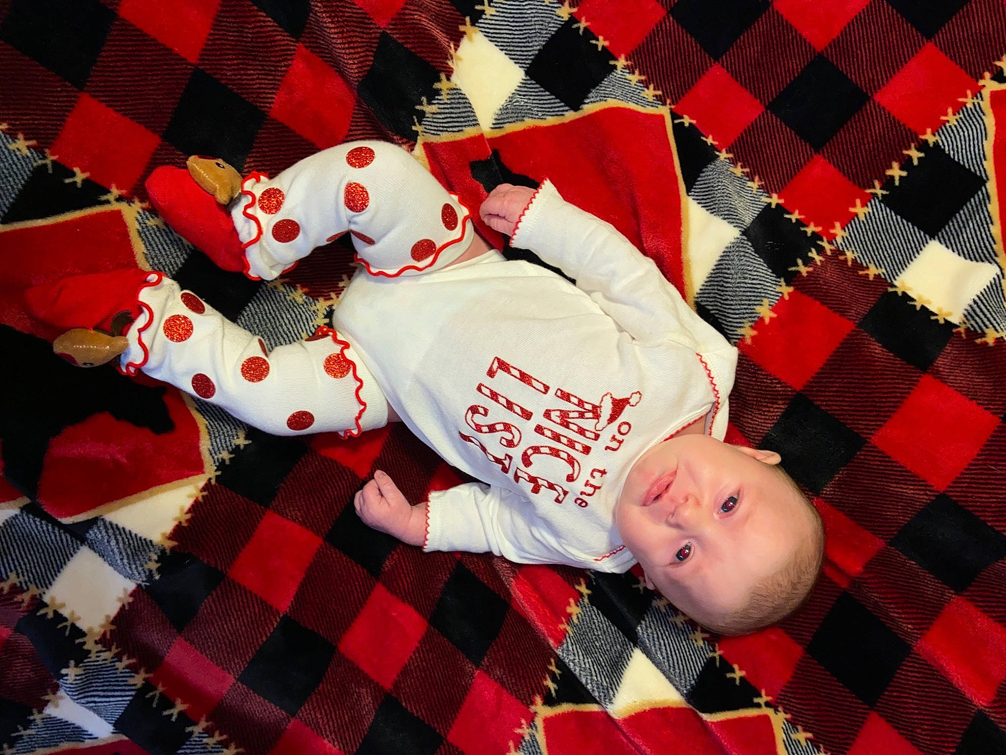 Brynleigh is registered to the contest to win money with this photo: baby, baby_products, baby_toddler_clothing, bedtime, carmine, craft, design, linens, nightwear, pajamas, pattern, person, plaid, quilt, red, stuffed_toy, tartan, textile, woven_fabric