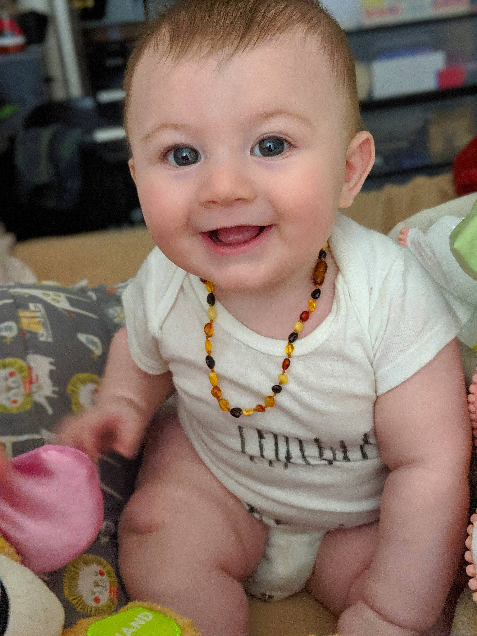 Jessilyn is registered to the contest to win money with this photo: baby, cheek, child, chin, ear, eye, face, facial_expression, head, iris, joy, lip, person, sitting, skin, smile, toddler