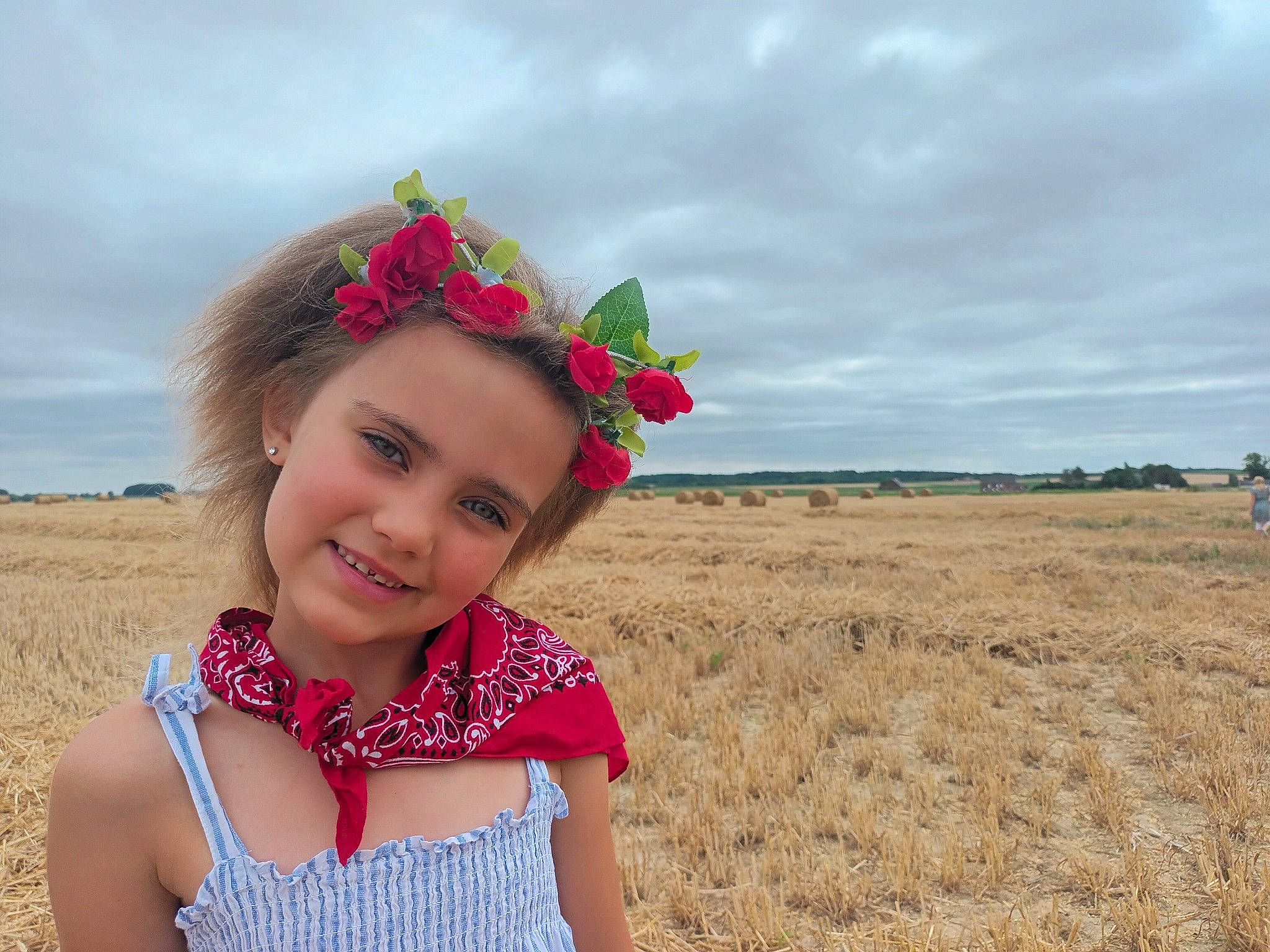 Camille participe au concours pour gagner de l'argent avec cette photo : child, cloud, fashion_accessory, flower, fun, grass, grass_family, grassland, happy, headband, headpiece, headwear, joy, landscape, people_in_nature, person, plant, prairie, sky, smile