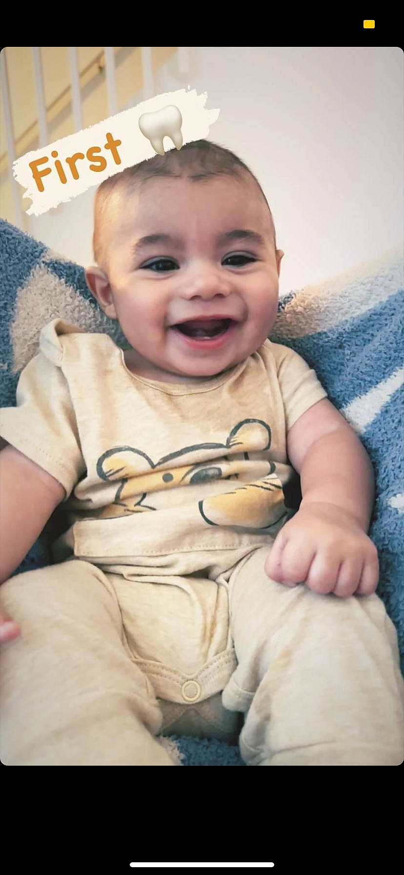 Maxwell is registered to the contest to win money with this photo: arm, baby, baby_toddler_clothing, cheek, child, comfort, eye, finger, gesture, hand, happy, head, human_body, joy, lip, nose, person, skin, sleeve, smile