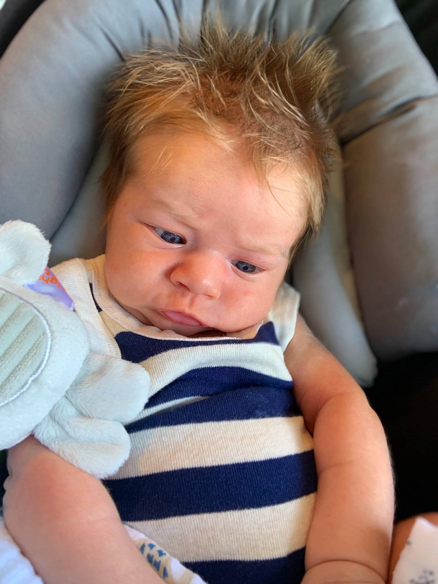 Michael is registered to the contest to win money with this photo: baby, baby_in_car_seat, baby_products, cheek, child, ear, eye, face, finger, nose, person, skin, toddler