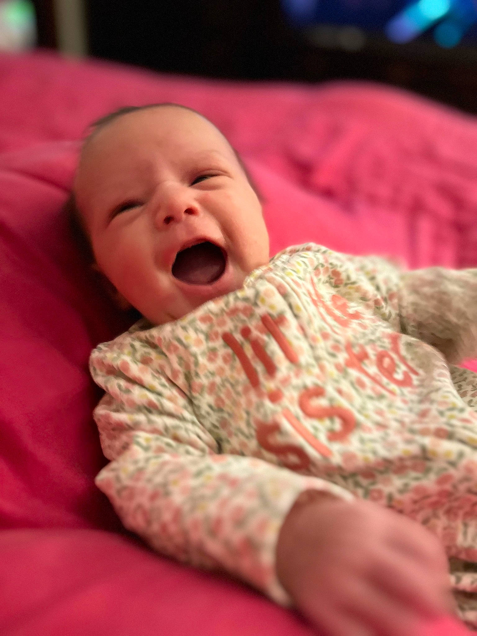 Isabella is registered to the contest to win money with this photo: baby, cheek, child, chin, comfort, eye, happy, human_body, linens, lip, magenta, mammal, mouth, nose, person, pink, skin, sleeve, smile, textile