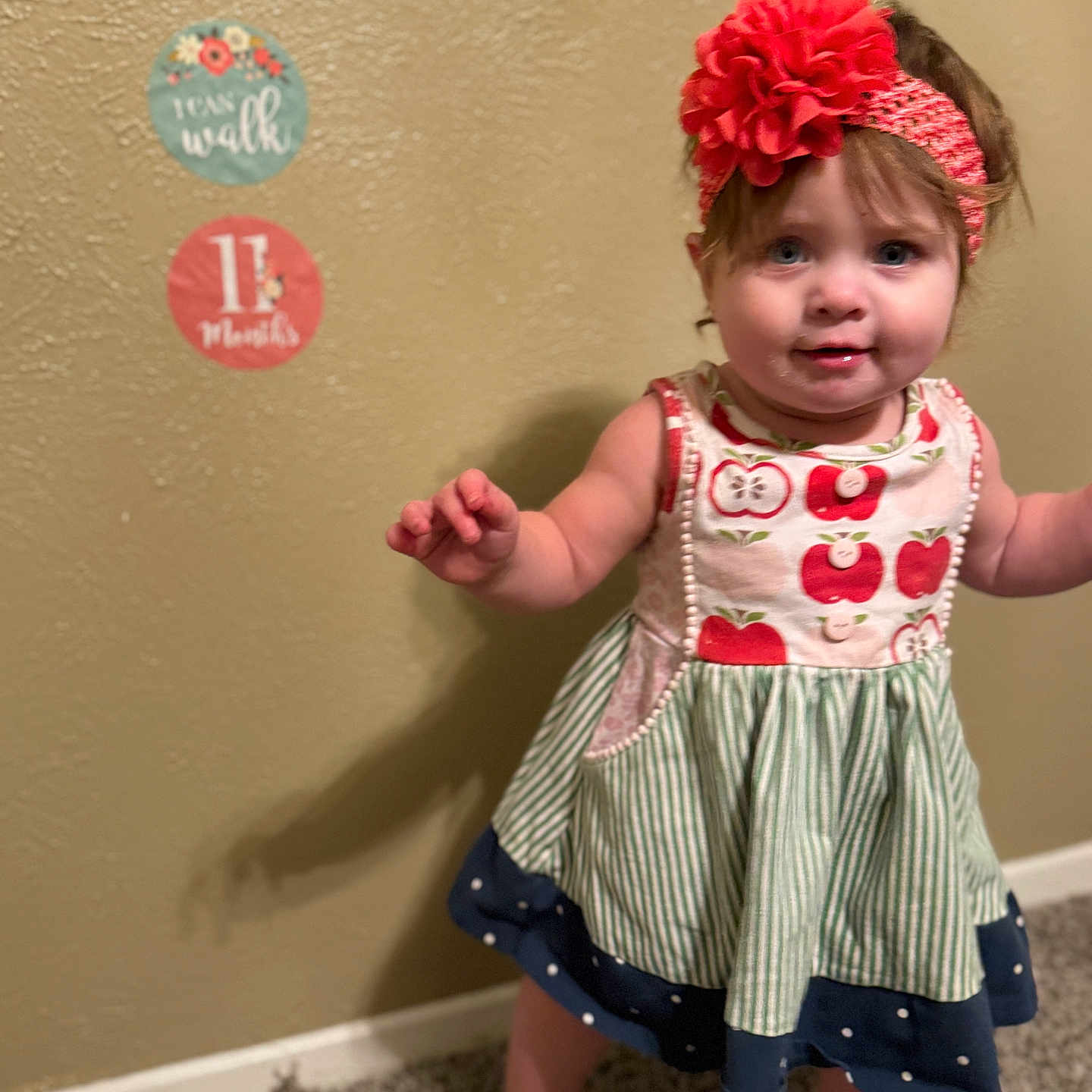 Josephine is registered to the contest to win money with this photo: accessories, baby, bag, bodypart, clothing, costume, dress, face, finger, flower, hand, handbag, hat, head, pattern, person, photography, plant, portrait, shorts