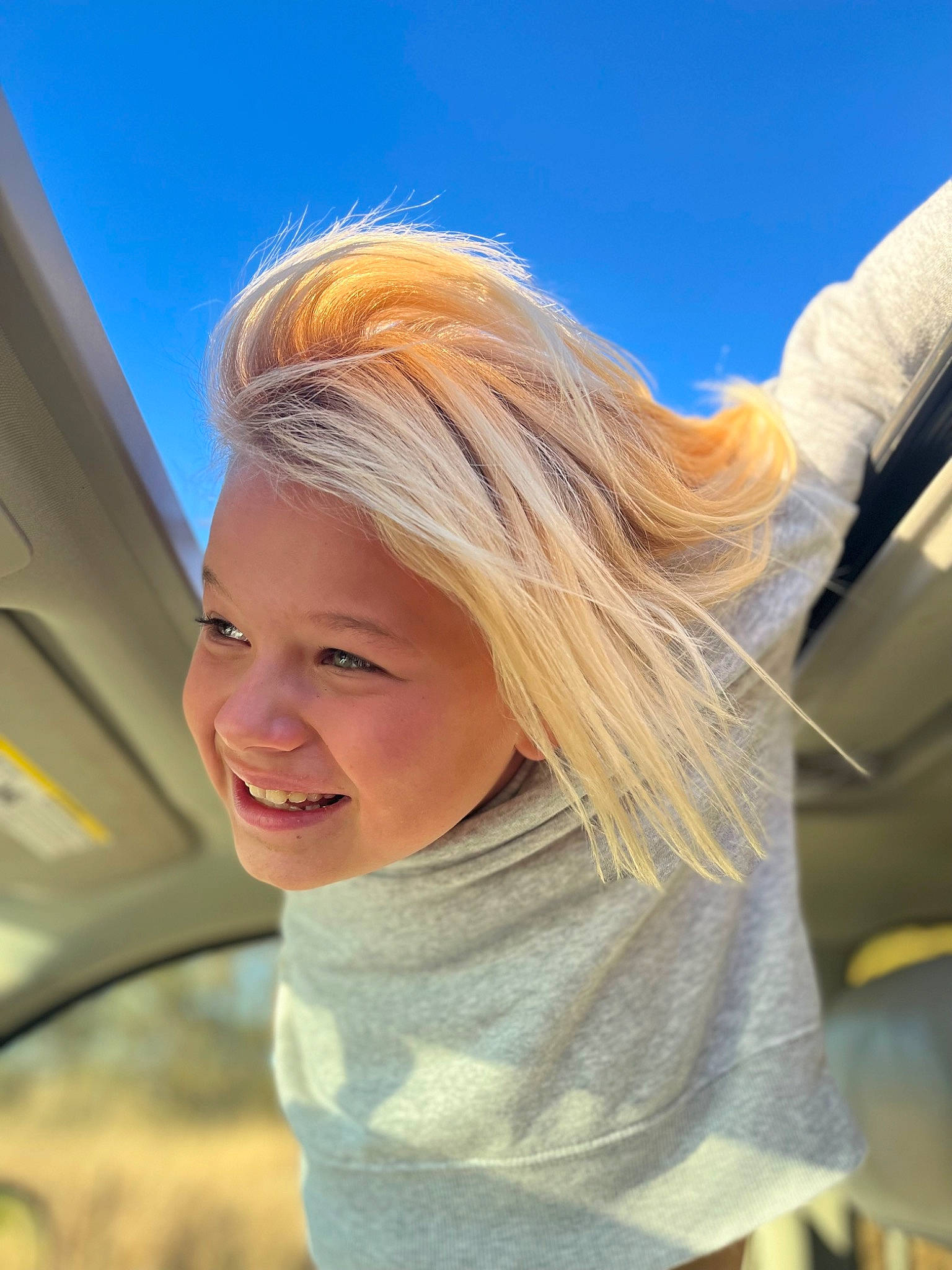 Lillei'Ann joined the competition — help win amazing prizes! automotive_wheel_system, blond, brown_hair, child, eye, face, family_car, fun, grass, happy, joy, leisure, lip, person, plant, recreation, red_hair, sky, smile, toddler