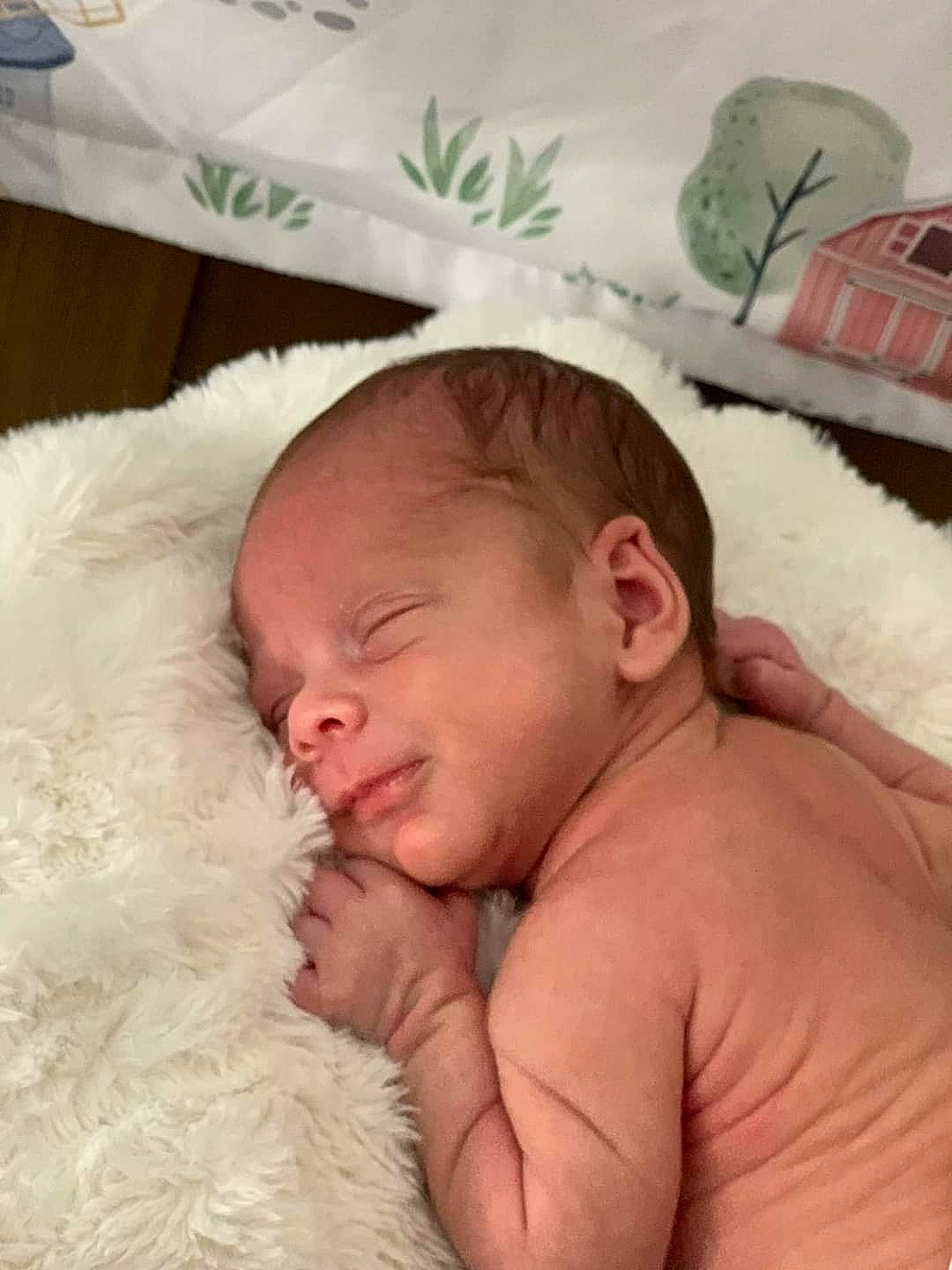 Banks is registered to the contest to win money with this photo: baby, bedtime, cheek, comfort, ear, event, eye, eyelash, face, happy, head, human_body, iris, linens, lip, mouth, nose, person, skin, smile