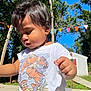 Matteo joined the competition — help win amazing prizes! toddler, child, outdoor, sunny, shirt, cartoon, sharks, trees, flags, colorful, playground, curious, greenery, daylight, person, summer, casual_clothing, nature, young_child, candid
