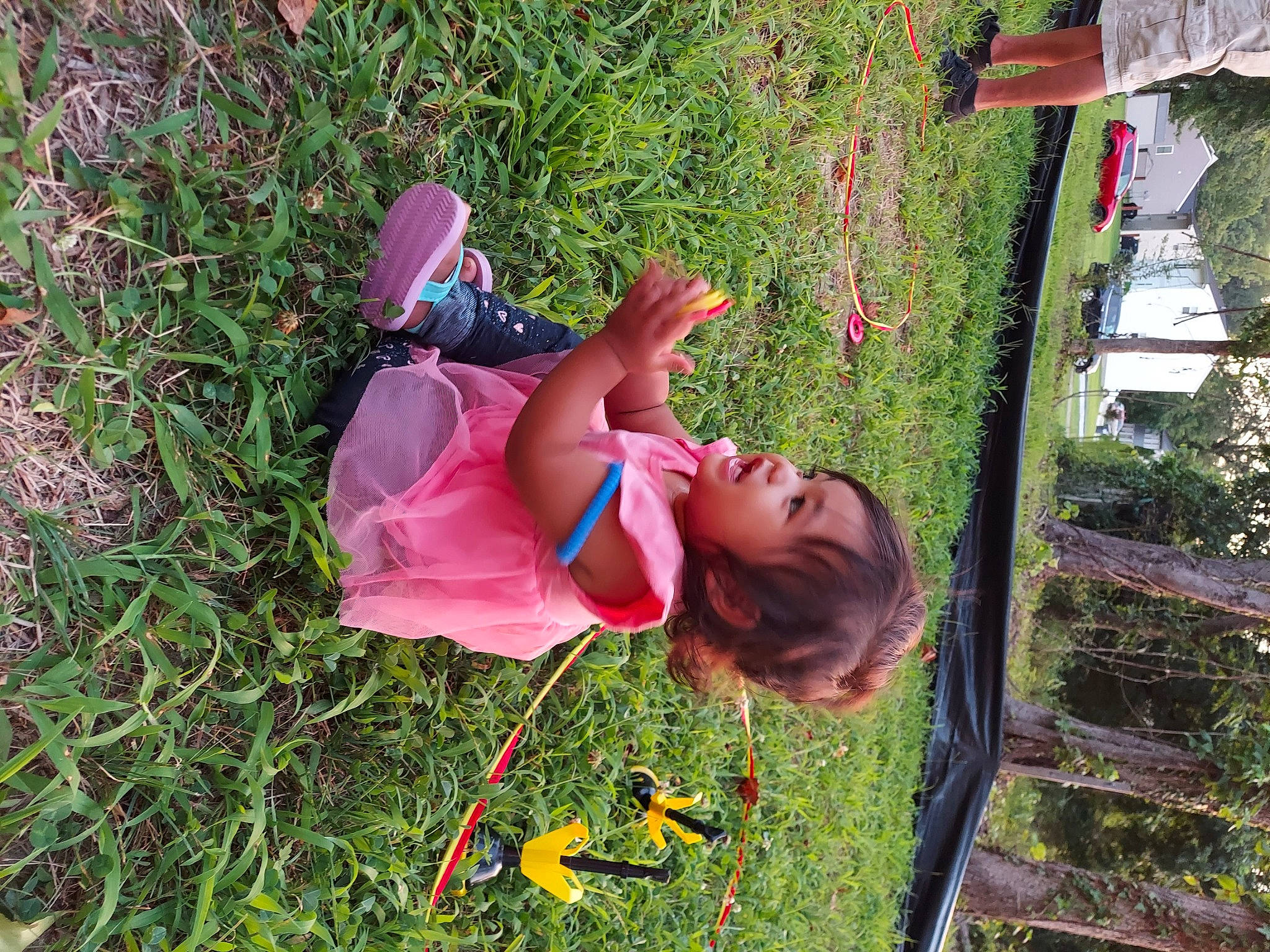 Saphira joined the competition — help win amazing prizes! botany, child, flower, fun, garden, grass, groundcover, happy, hat, leaf, leisure, magenta, people_in_nature, person, petal, plant, recreation, spring, toddler, tree