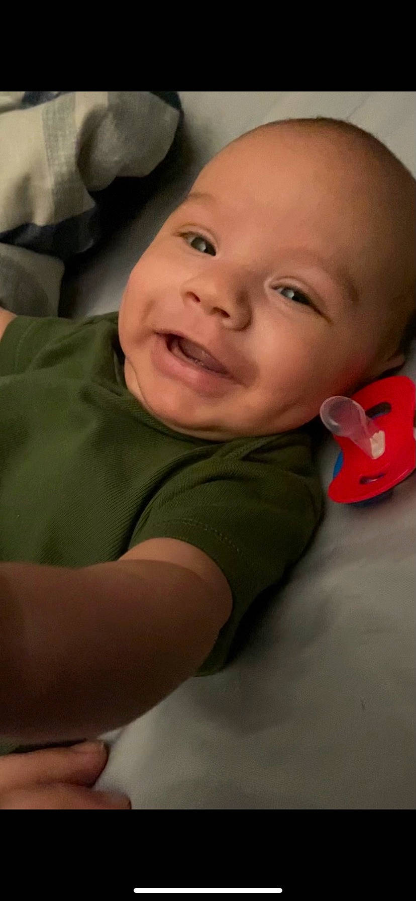 Andre is registered to the contest to win money with this photo: baby, baby_toddler_clothing, cheek, chin, comfort, eye, eyebrow, face, flash_photography, forehead, gesture, happy, head, headgear, iris, lip, mouth, nose, person, skin