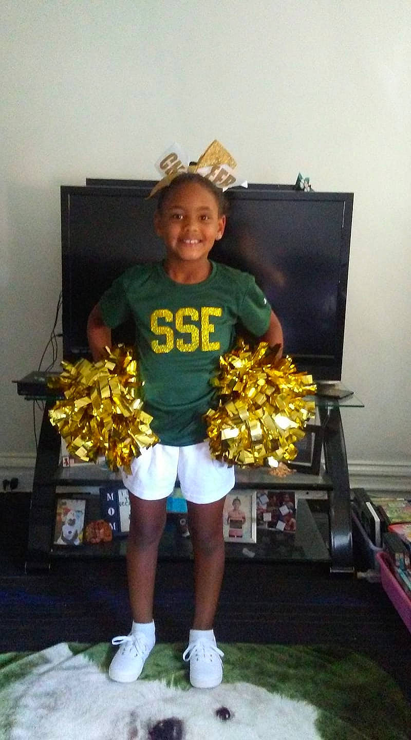 Tatiana joined the competition — help win amazing prizes! cheerleading, cheerleading_uniform, clothing, competition_event, costume, day, fun, joy, outerwear, person, product, recreation, sports_uniform, t_shirt, uniform