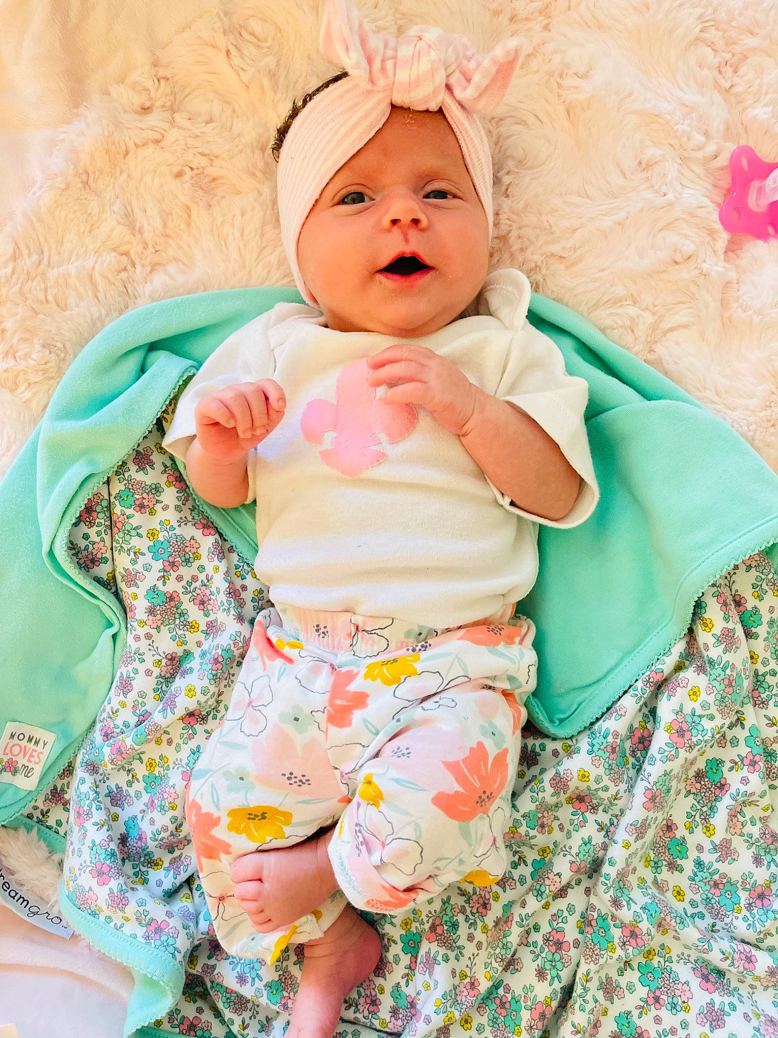 Isabell is registered to the contest to win money with this photo: baby, baby_sleeping, baby_toddler_clothing, cheek, child, comfort, eye, face, happy, head, headgear, headwear, linens, pattern, person, pink, skin, sleeve, smile, t_shirt