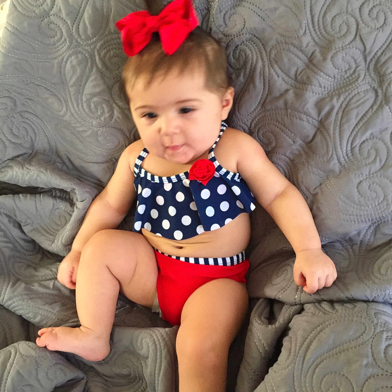 Ayah joined the competition — help win amazing prizes! baby, baby_bloomers, baby_toddler_clothing, child, child_model, clothing, costume, costume_accessory, design, fashion_accessory, hair_accessory, headband, headgear, headpiece, leotard, pattern, person, polka_dot, product, sitting