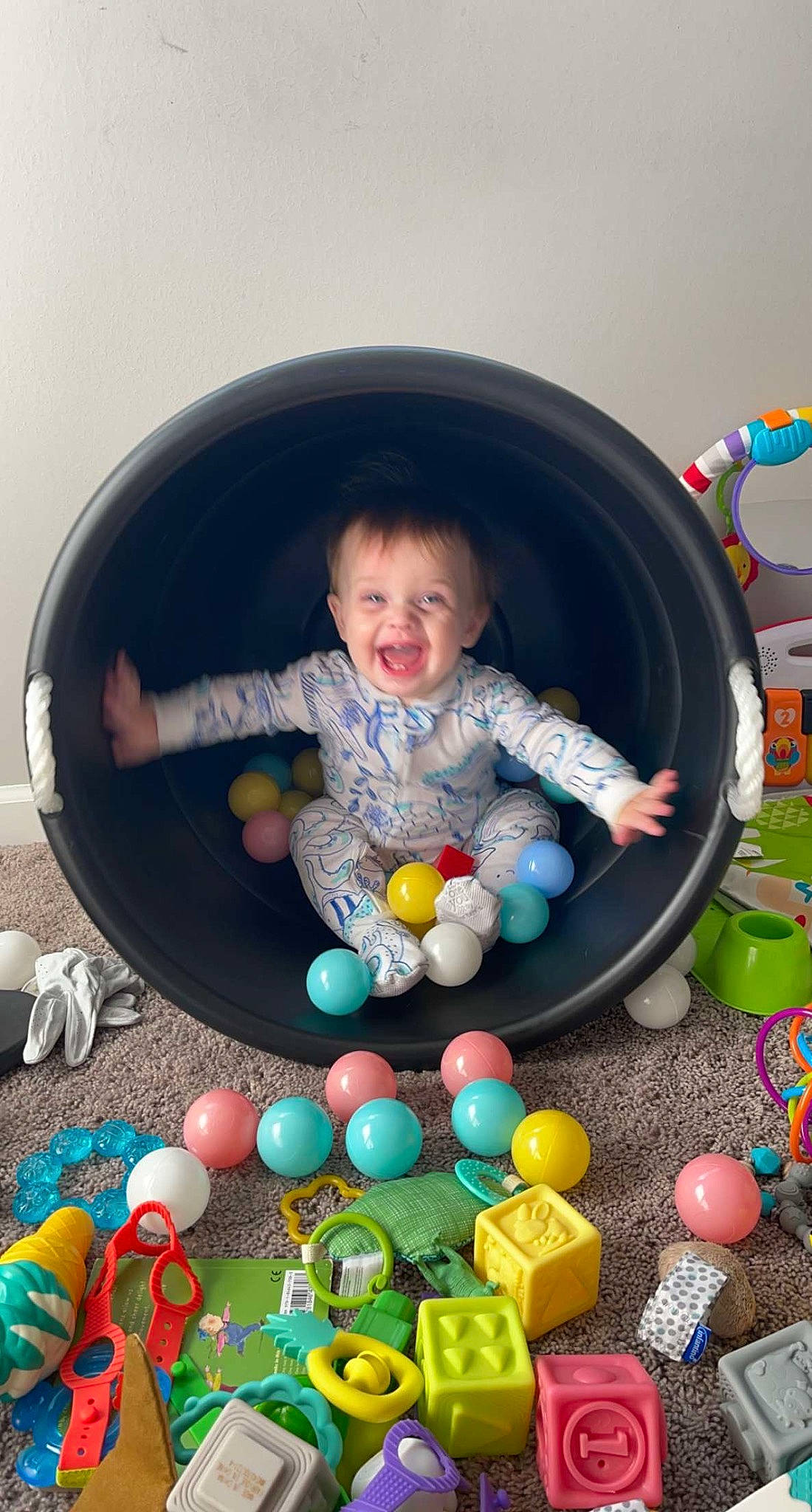 Malakai is registered to the contest to win money with this photo: baby, baby_products, baby_toddler_clothing, baby_toys, ball_pit, child, circle, comfort, event, fun, happy, leisure, person, play, product, recreation, sitting, sleeve, smile, toddler