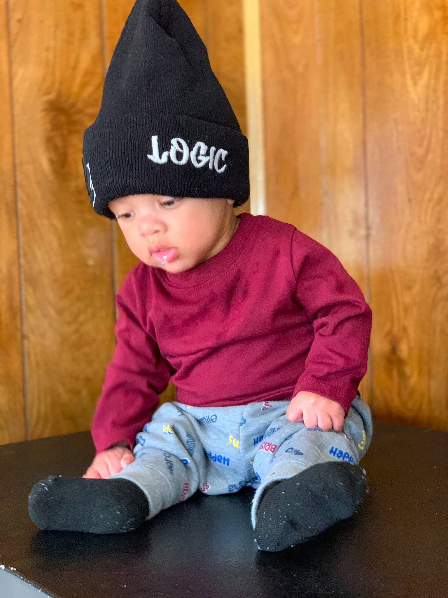 Zakari is registered to the contest to win money with this photo: baby, baby_toddler_clothing, beanie, bonnet, cap, child, hat, headgear, headwear, knit_cap, knitting, person, toddler, wool
