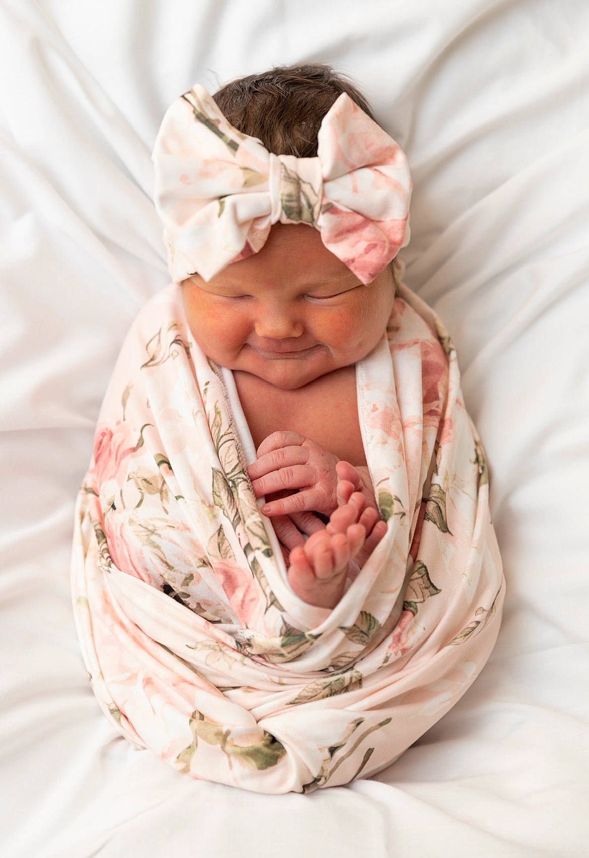 Paisley joined the competition — help win amazing prizes! baby, baby_products, baby_sleeping, baby_toddler_clothing, child, collar, comfort, fashion_accessory, gesture, happy, headwear, linens, pattern, peach, person, portrait_photography, sleeve, smile, textile, thumb