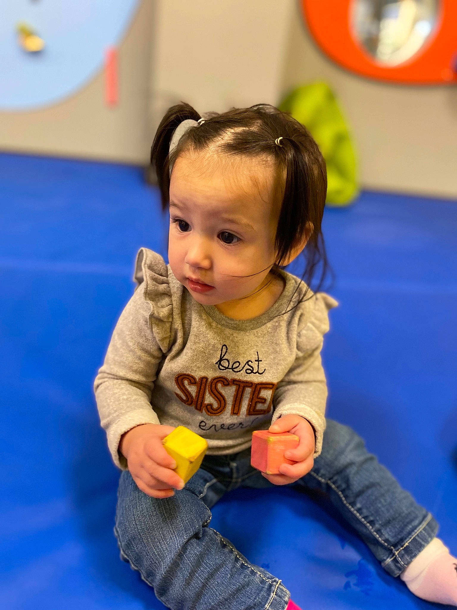 Bella joined the competition — help win amazing prizes! baby_toddler_clothing, child, competition_event, electric_blue, event, flooring, fun, hair, happy, individual_sports, kindergarten, leisure, person, play, recreation, room, sitting, skin, sports, toddler