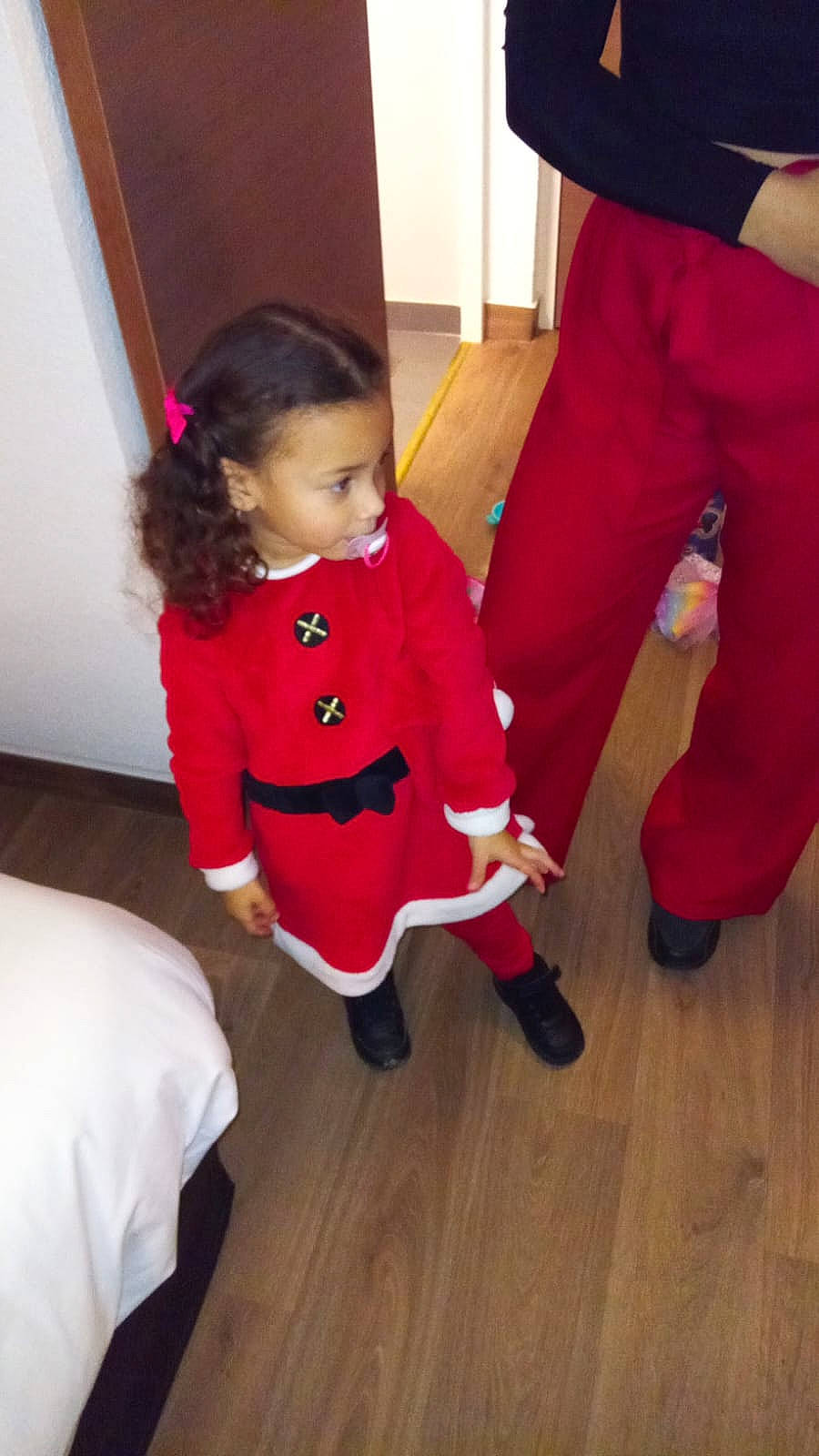 Ayanna Mia-luna participe au concours pour gagner de l'argent avec cette photo : baby_toddler_clothing, carmine, child, dress, event, floor, flooring, fun, gesture, happy, hardwood, human_leg, lap, leg, magenta, person, sleeve, sock, thigh, toddler