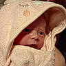 Sunniva is registered to the contest to win money with this photo: baby, towel, hooded_towel, infant, cute, soft_texture, wrapped, close_up, face, eyes, skin, embroidery, animal_ears, child, newborn, cozy, warm, indoor, person, portrait