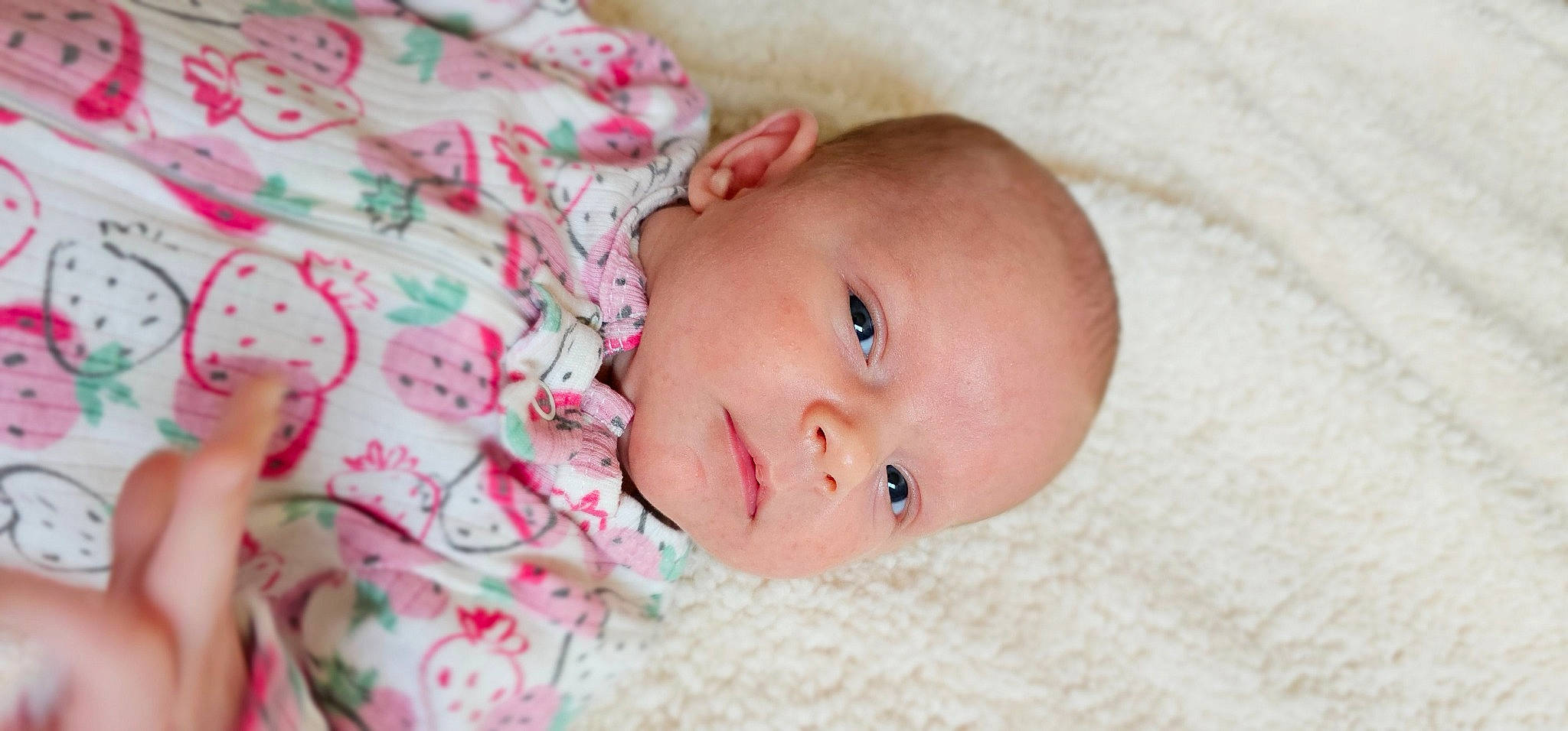 Brynlee is registered to the contest to win money with this photo: baby, baby_toddler_clothing, cheek, chin, comfort, eye, eyebrow, eyelash, face, hair, head, iris, lip, mouth, nose, person, pink, skin, smile, textile