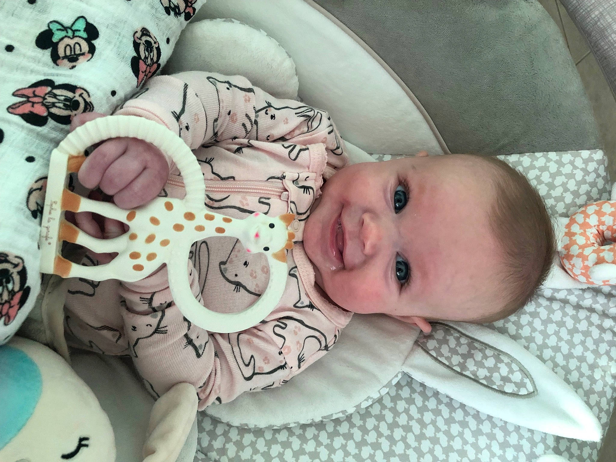 Keeva is registered to the contest to win money with this photo: baby, baby_products, baby_safety, baby_toddler_clothing, cheek, child, comfort, couch, eyelash, headgear, infant_bed, linens, mammal, mouth, pattern, person, room, skin, sleeve, smile