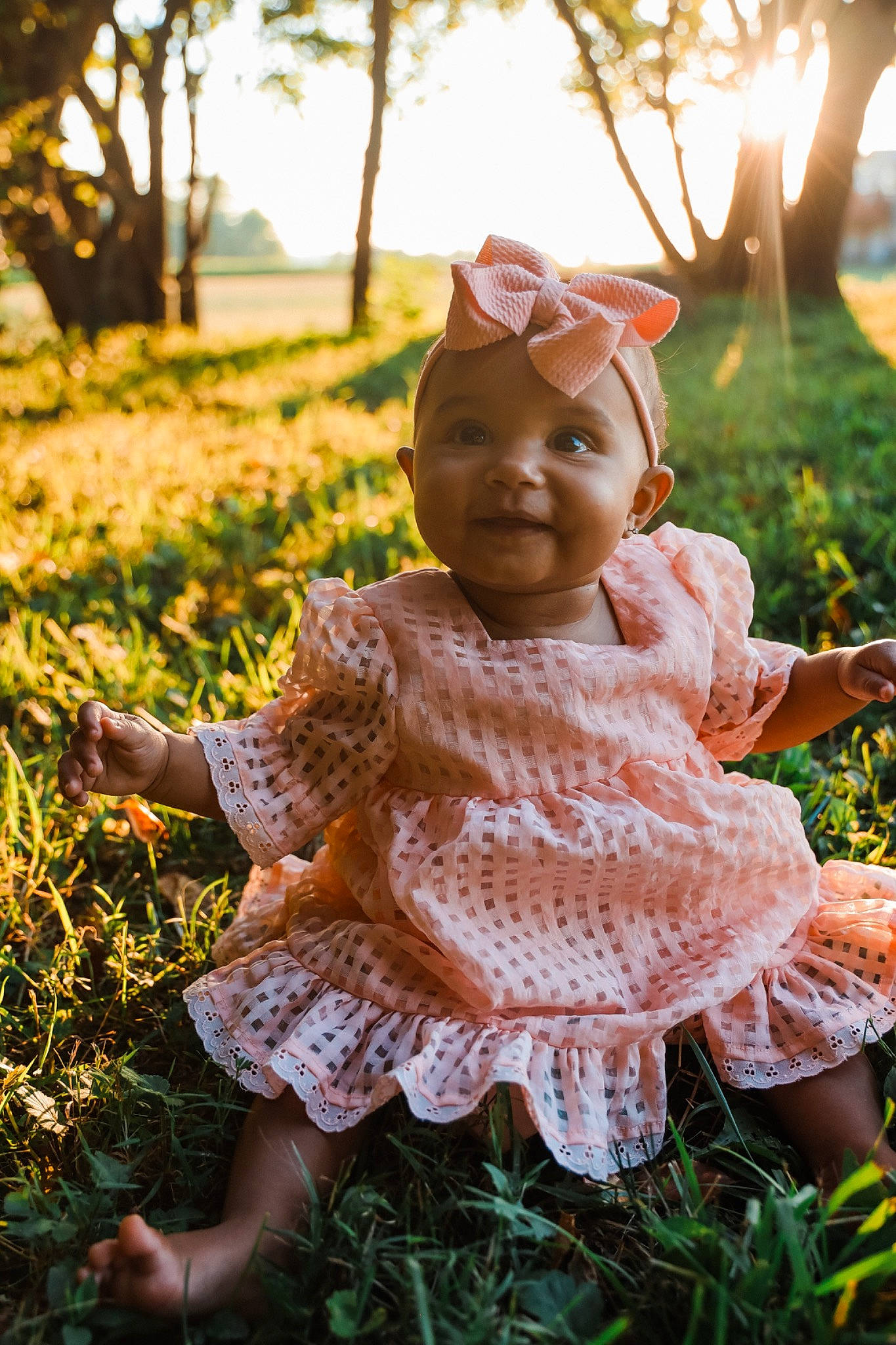 Evie joined the competition — help win amazing prizes! baby, baby_toddler_clothing, botany, dress, eye, fawn, grass, happy, hat, headgear, headwear, leaf, people_in_nature, person, photograph, pink, plant, skin, sun_hat, sunlight