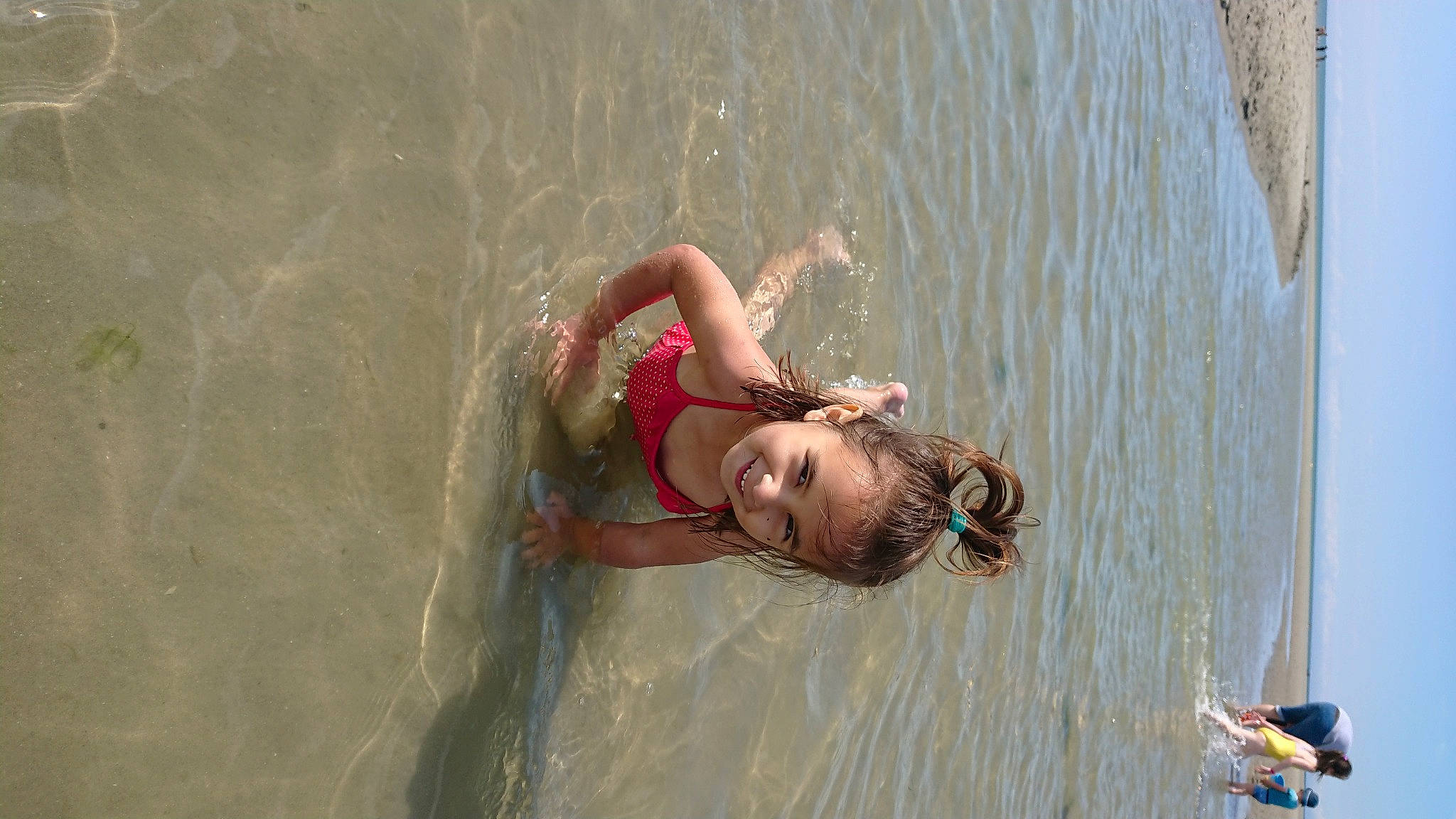 Timea a rejoint le concours — aidez-le/la à gagner de superbes lots ! bathing, beach, child, fun, happy, joy, lake, leisure, people_on_beach, person, personal_protective_equipment, play, recreation, sea, smile, sports, swimwear, toddler, vacation, water