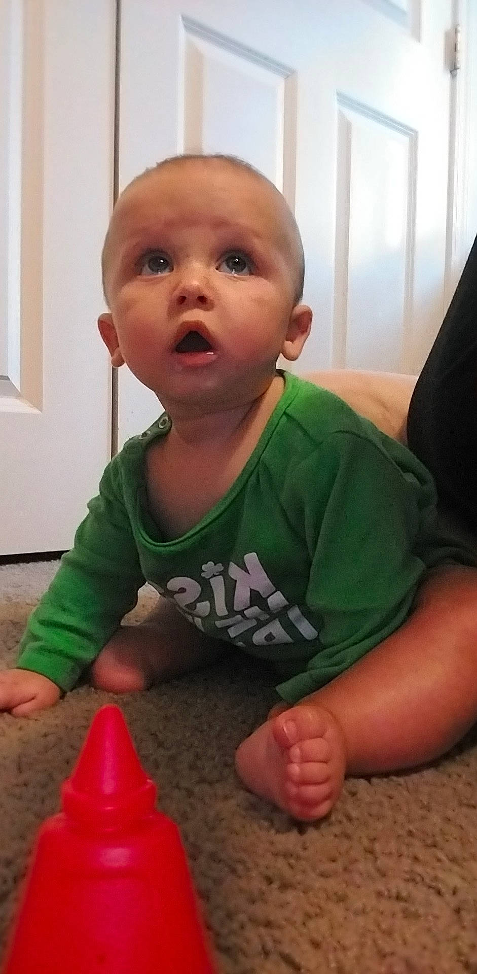 Onyx joined the competition — help win amazing prizes! baby, baby_toddler_clothing, cheek, cone, finger, floor, flooring, fun, happy, mouth, nail, nose, person, red, sitting, skin, sleeve, smile, surprise, t_shirt